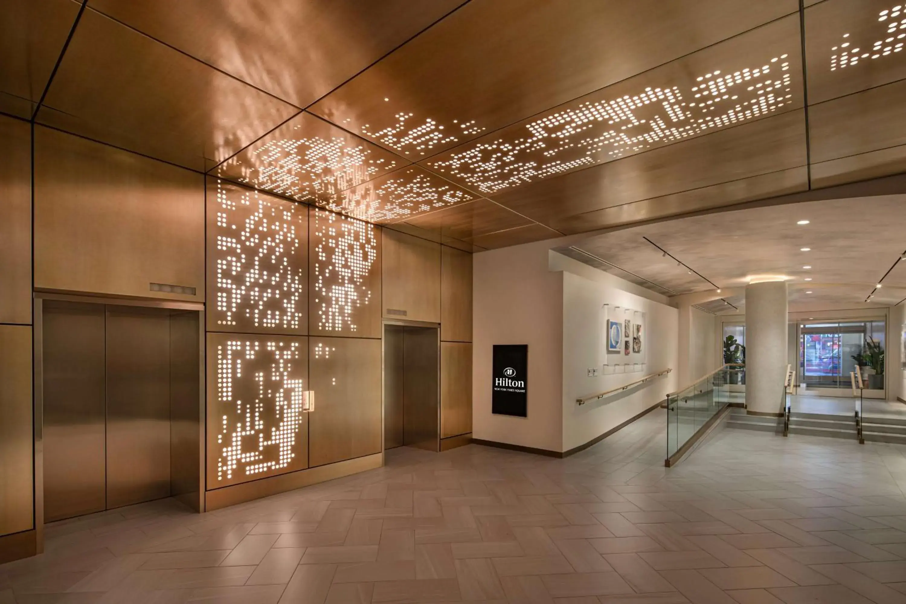 Lobby or reception in Hilton New York Times Square Lobby or reception in Hilton New York Times Square