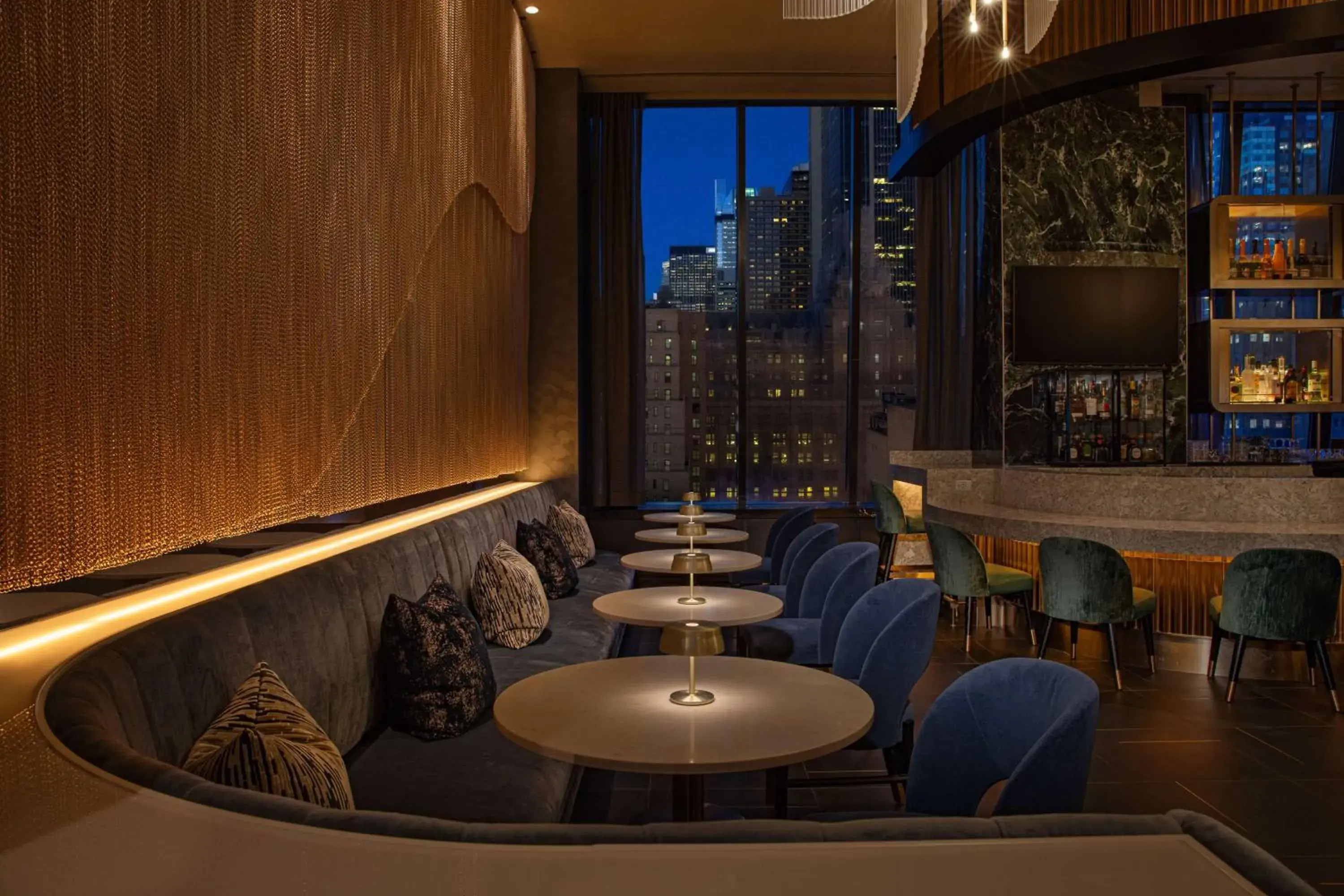 Lounge or bar in Hilton New York Times Square Lounge or bar in Hilton New York Times Square