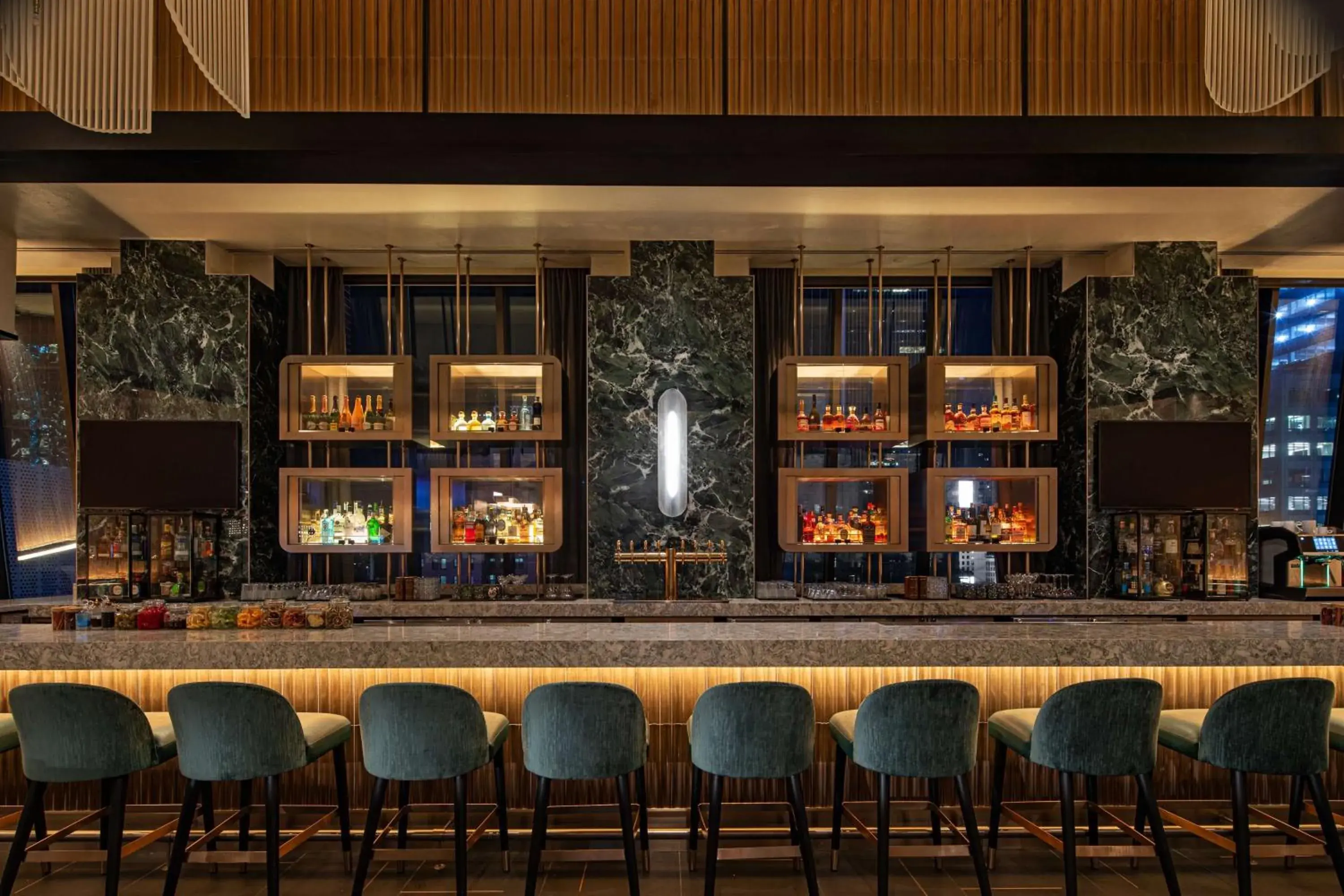 Lounge or bar in Hilton New York Times Square Lounge or bar in Hilton New York Times Square