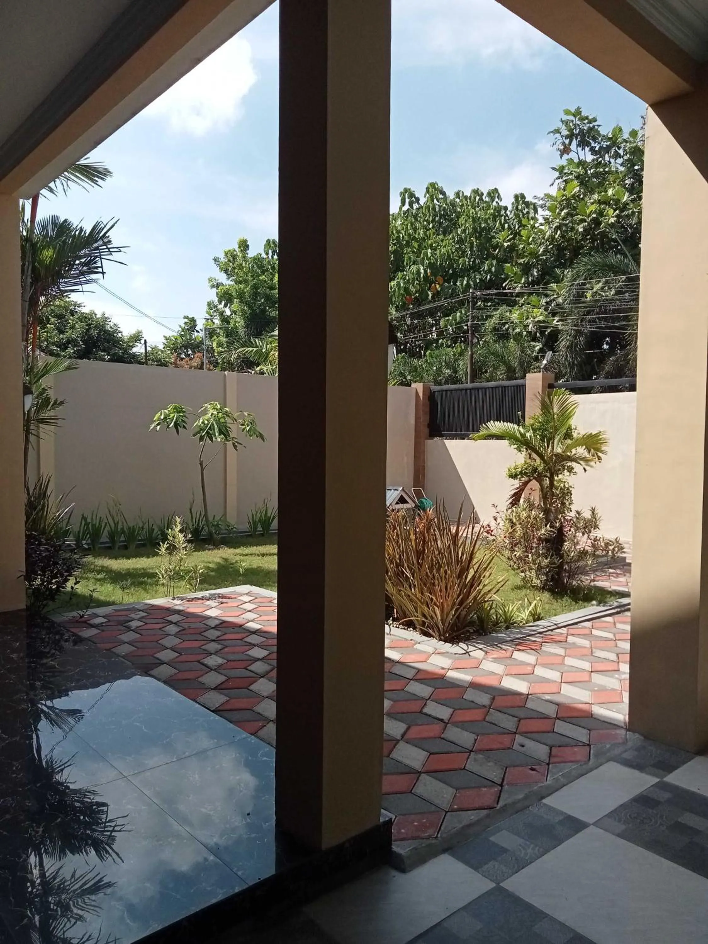 Facade/entrance in EXPRESS O 91708 Rumah Sriwijaya 12a Syariah