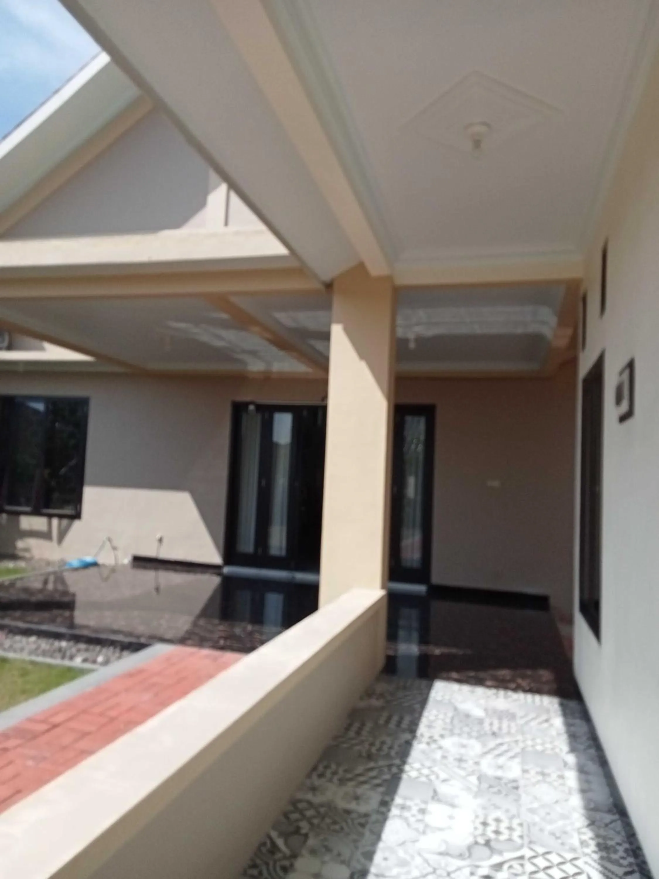 Facade/entrance in EXPRESS O 91708 Rumah Sriwijaya 12a Syariah