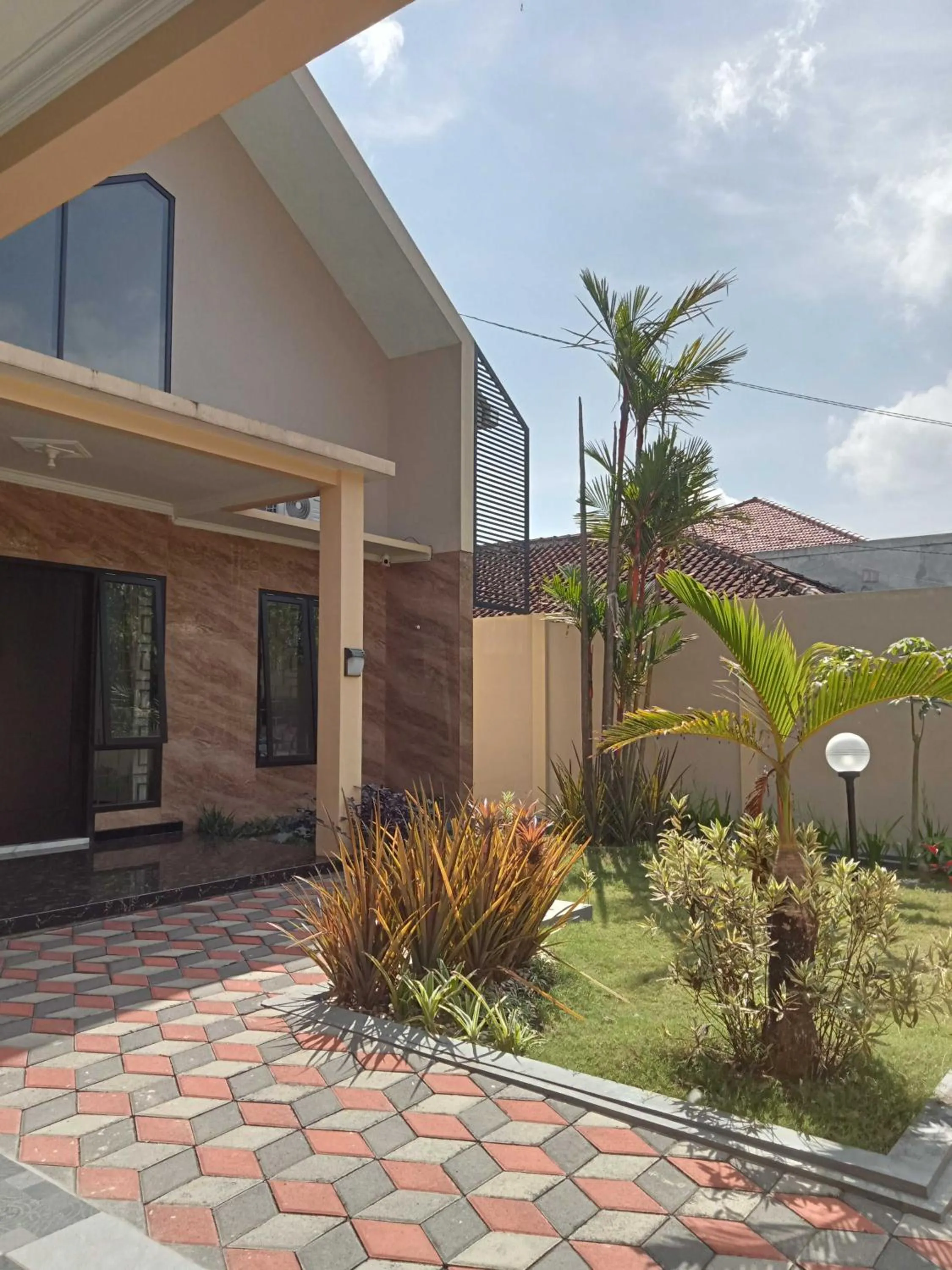 Facade/entrance in EXPRESS O 91708 Rumah Sriwijaya 12a Syariah