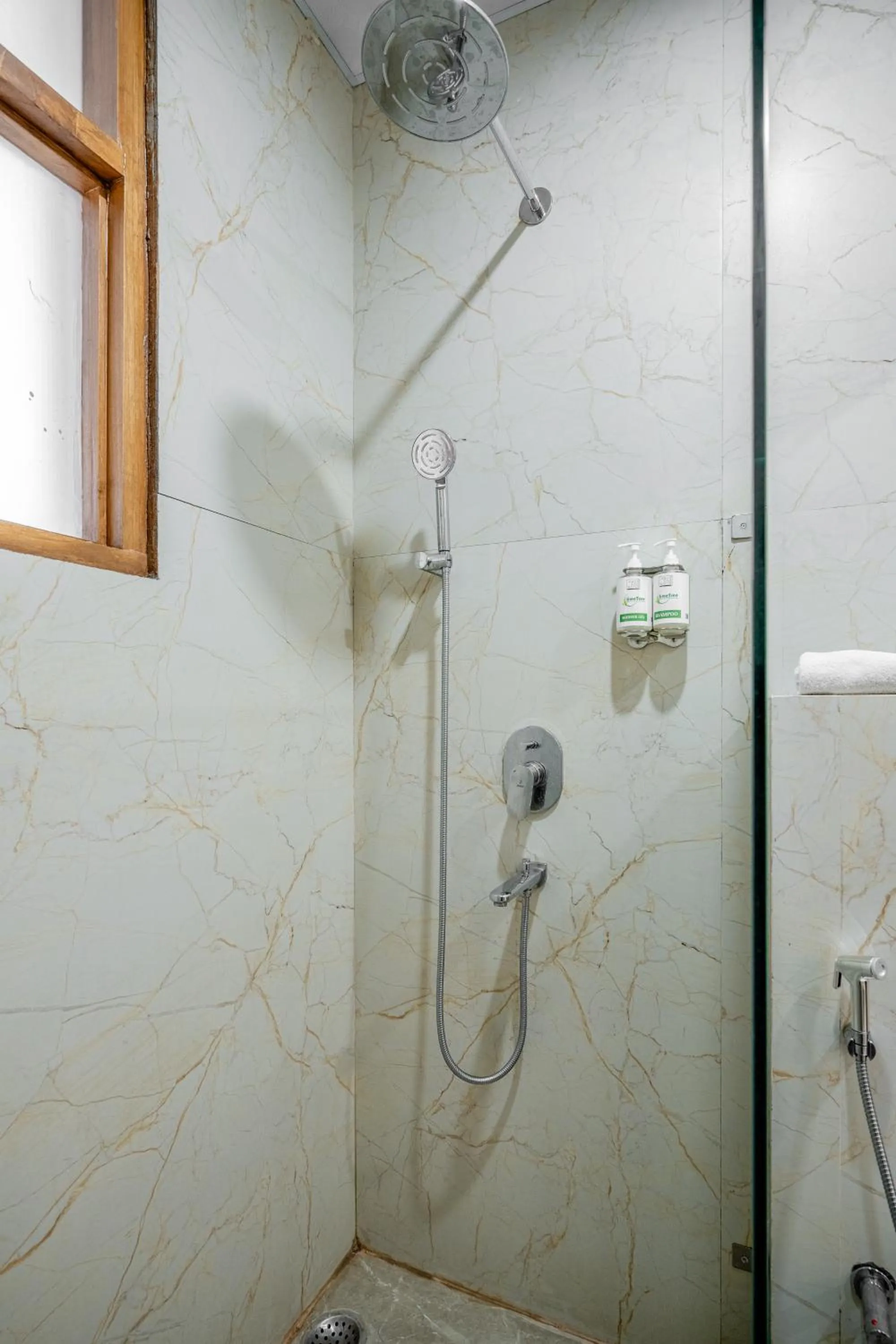 Bathroom in Lime Tree Hotels and Banquet Greater Noida