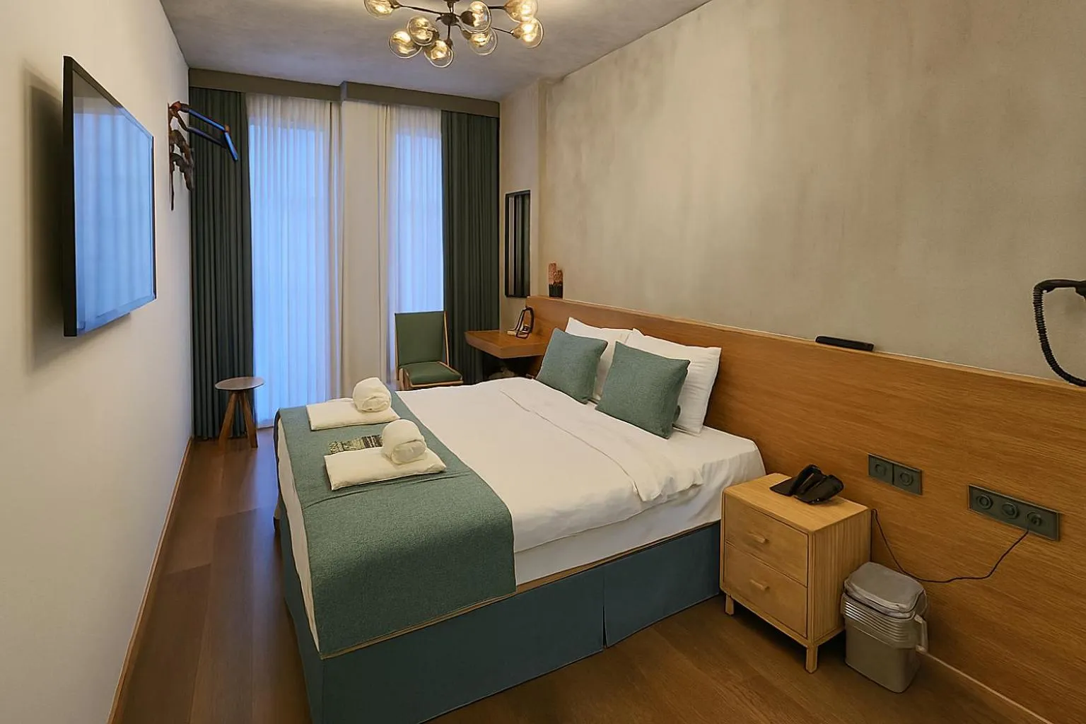 Bed in Aleksandr Pera Hotel