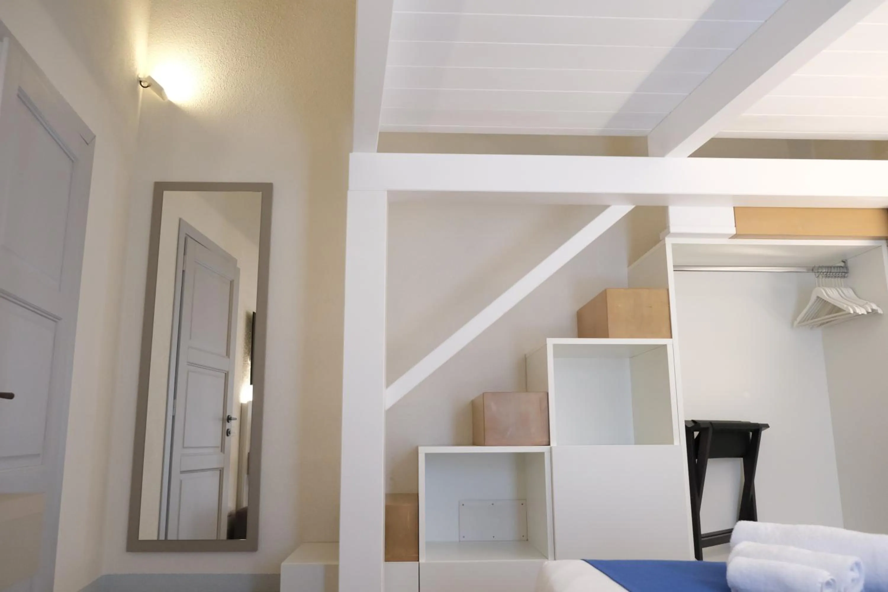 Bed in TANIT ROOMS & SPA