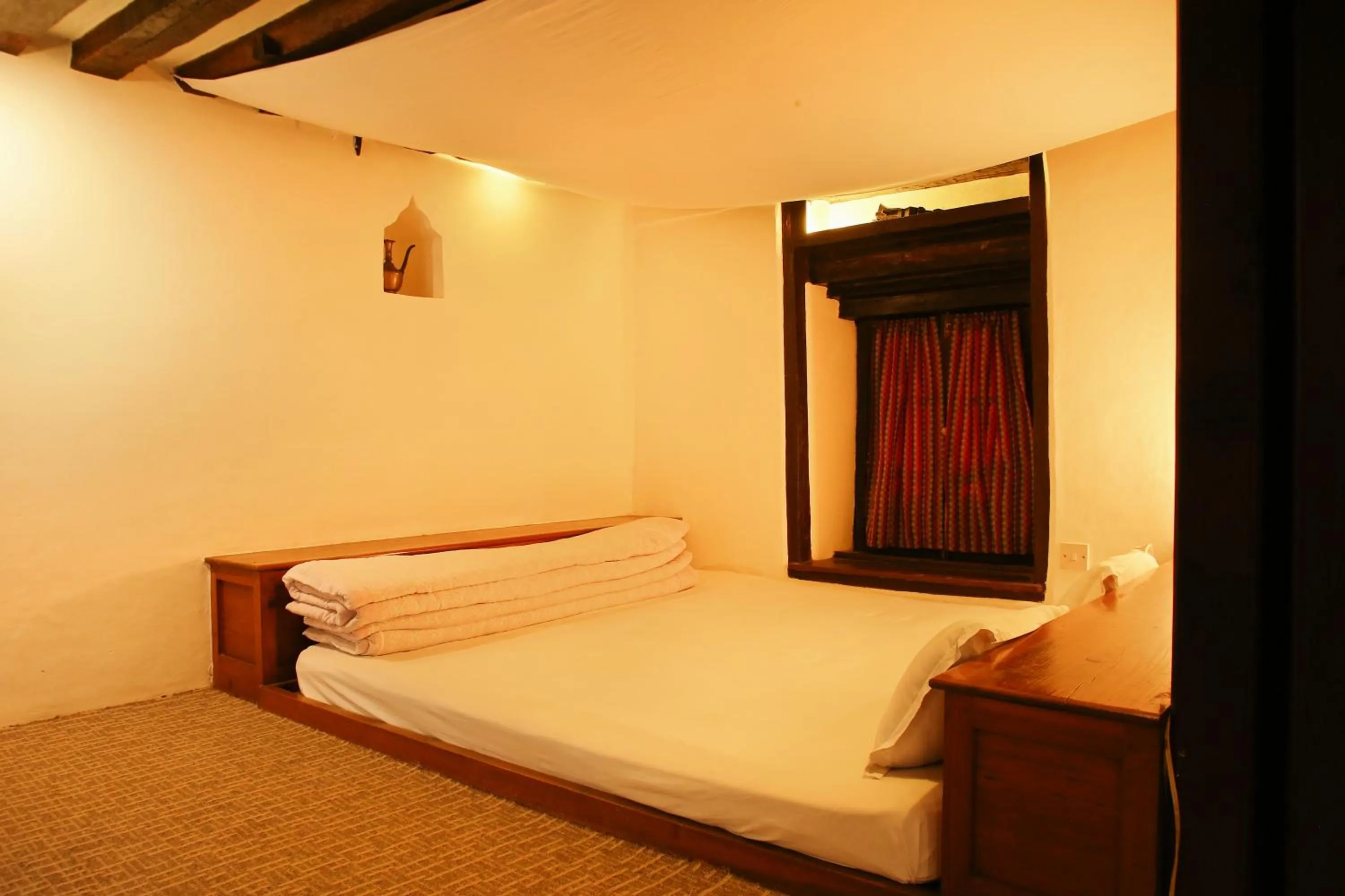 Bedroom, Bed in Newa Chen Historic House UNESCO