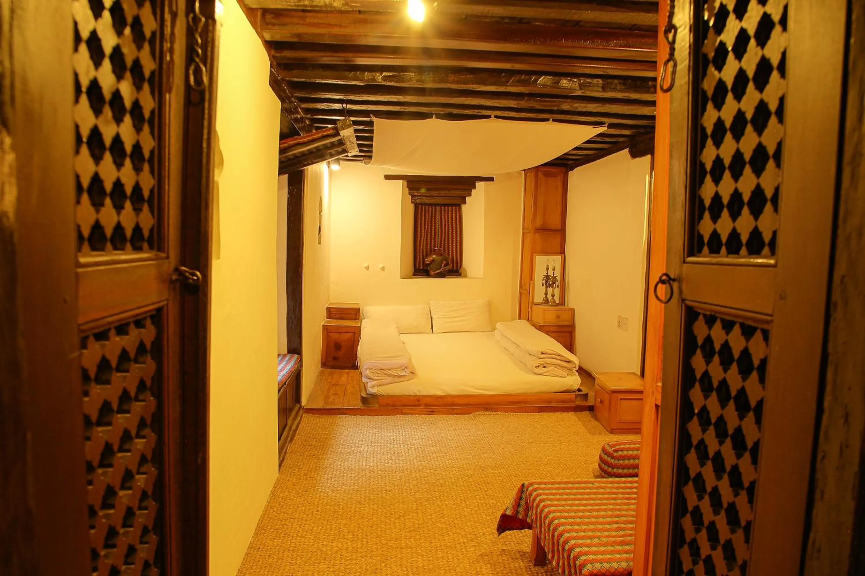 Bed in Newa Chen Historic House UNESCO
