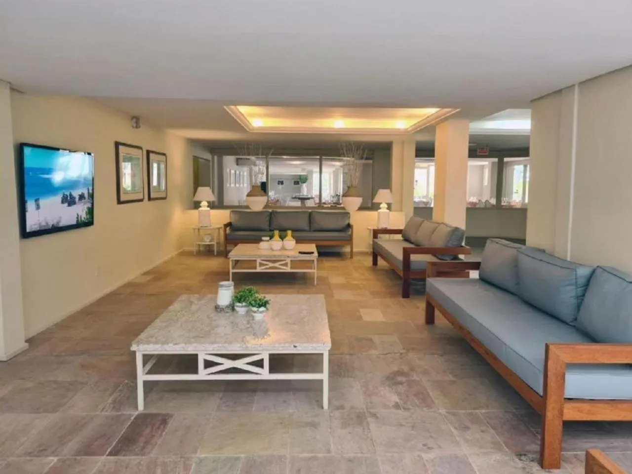 Living room in Lindo apartamento na praia brava