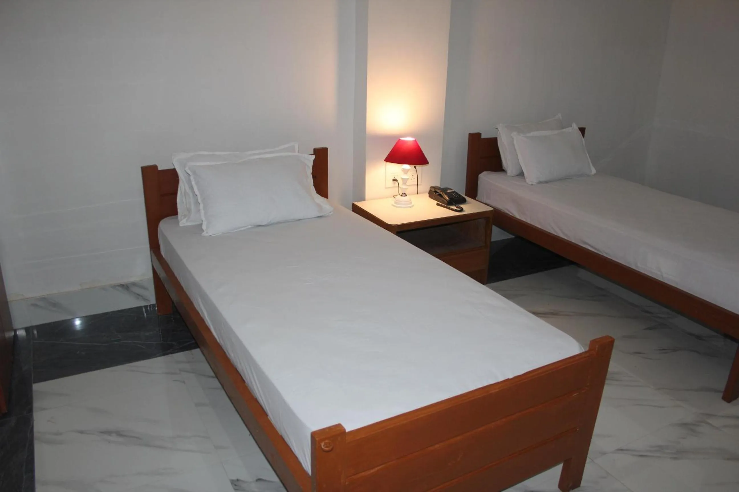 Bed in HOTEL BODHGAYA INN