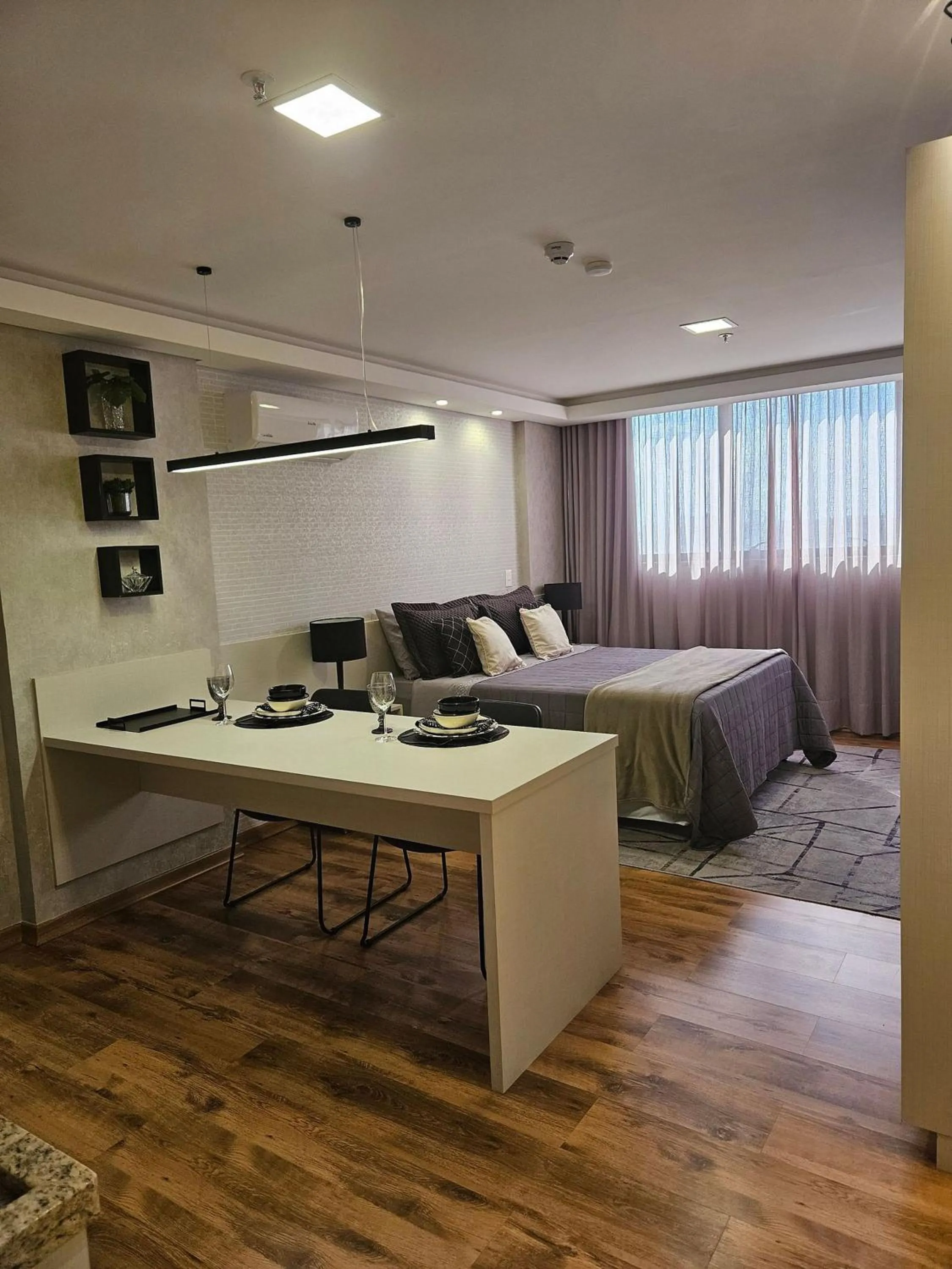 Seating area, Bed in Hotel Flat Afonso Pena e Centro de Convenções Campo Grande