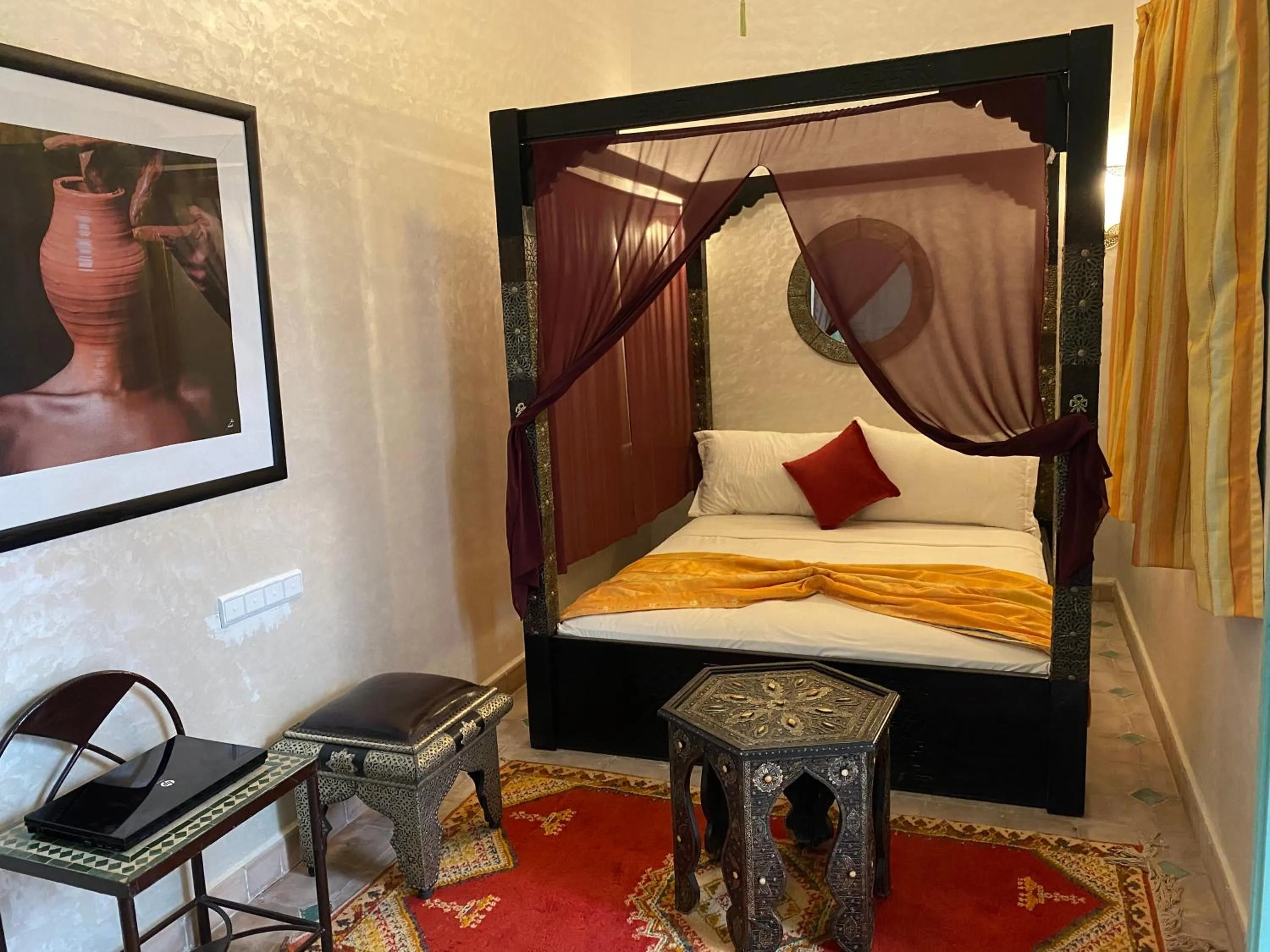 Bed in Riad Deux Palmiers