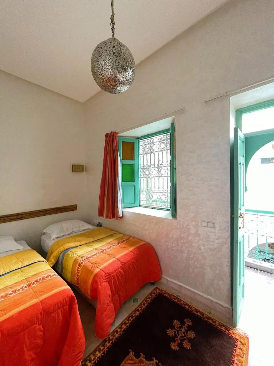Bed in Riad Deux Palmiers