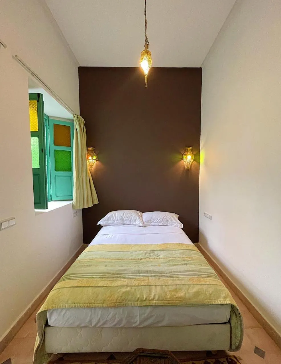 Bed in Riad Deux Palmiers