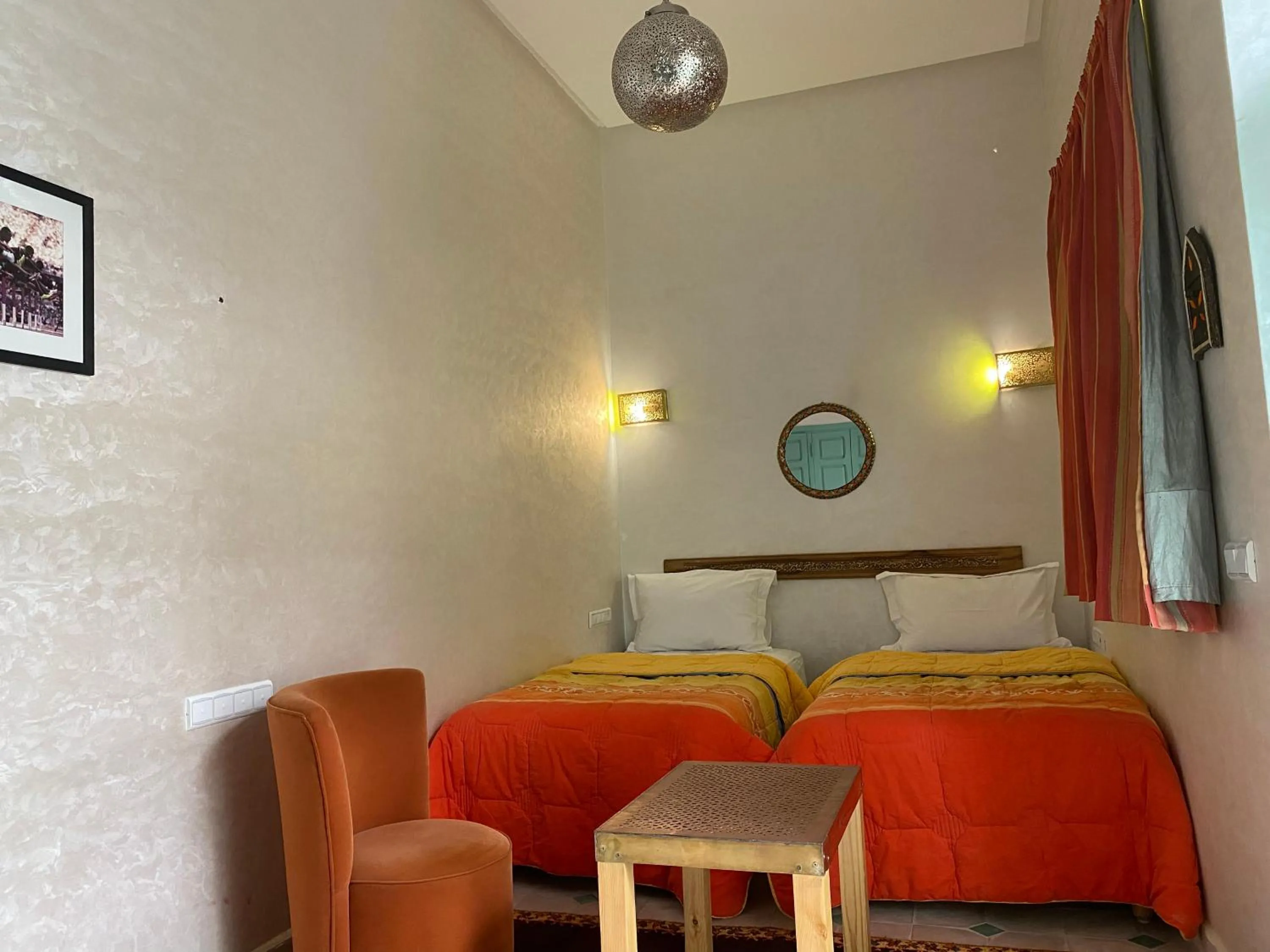 Bed in Riad Deux Palmiers