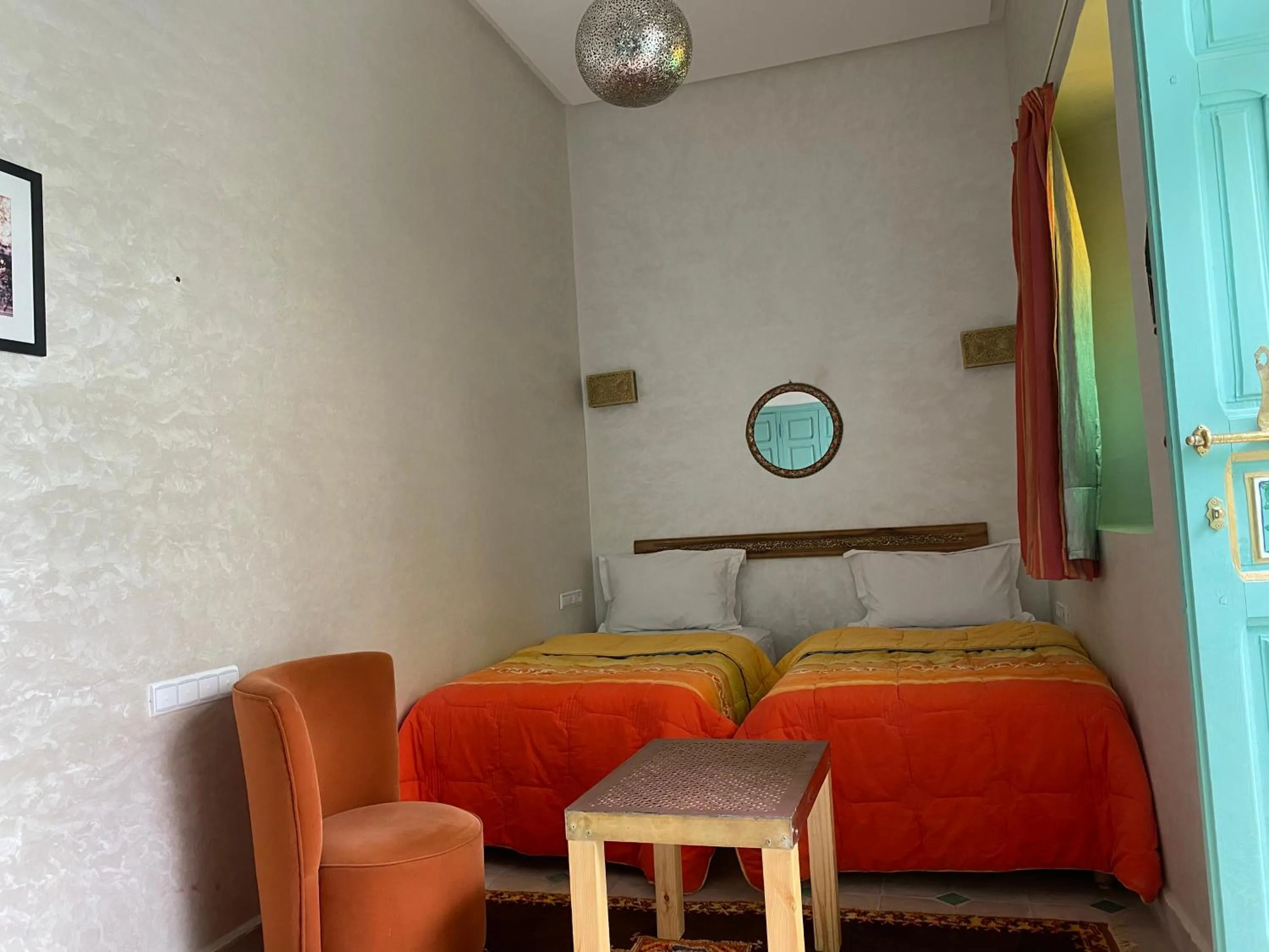 Bed in Riad Deux Palmiers
