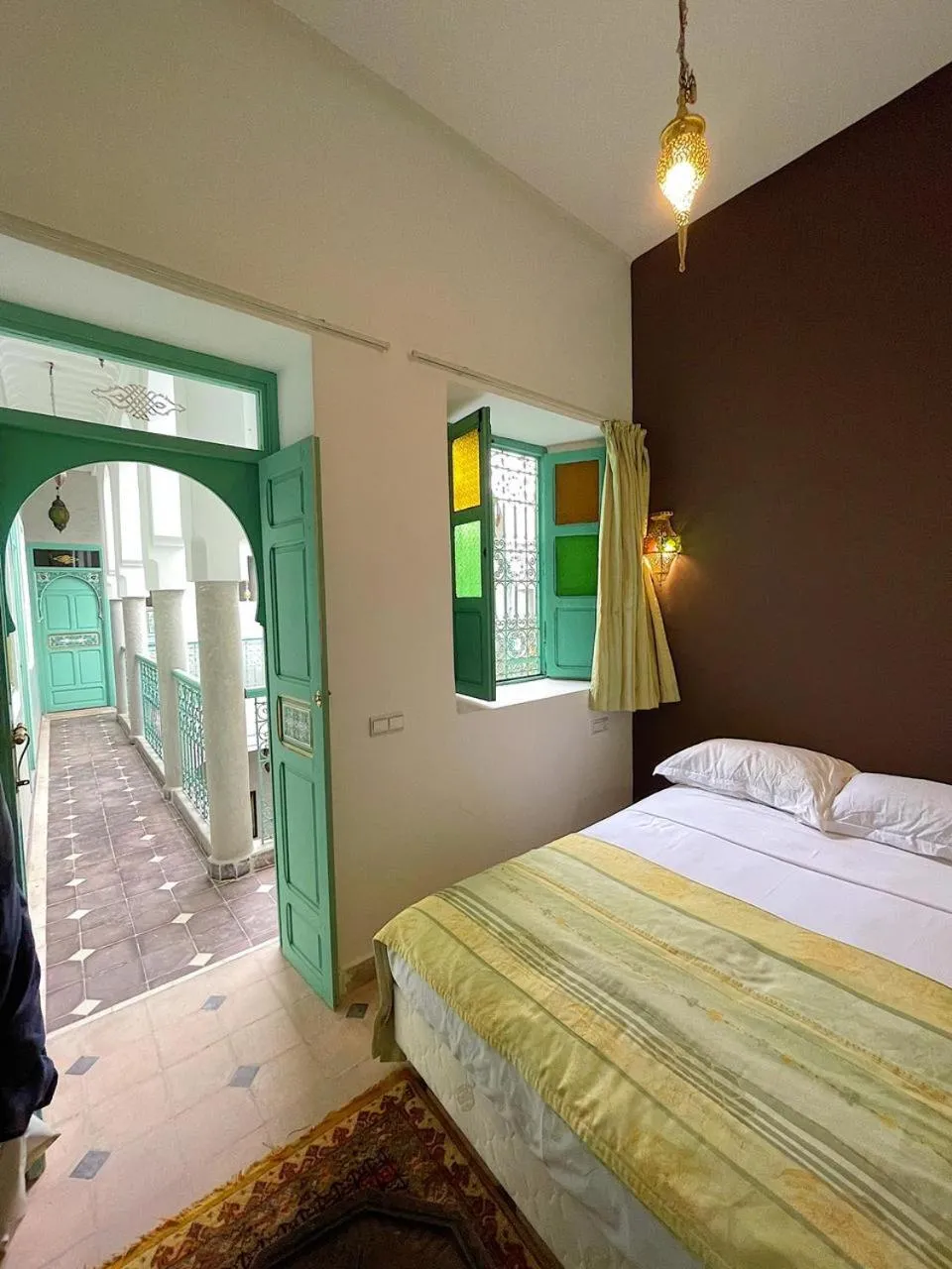 Bed in Riad Deux Palmiers