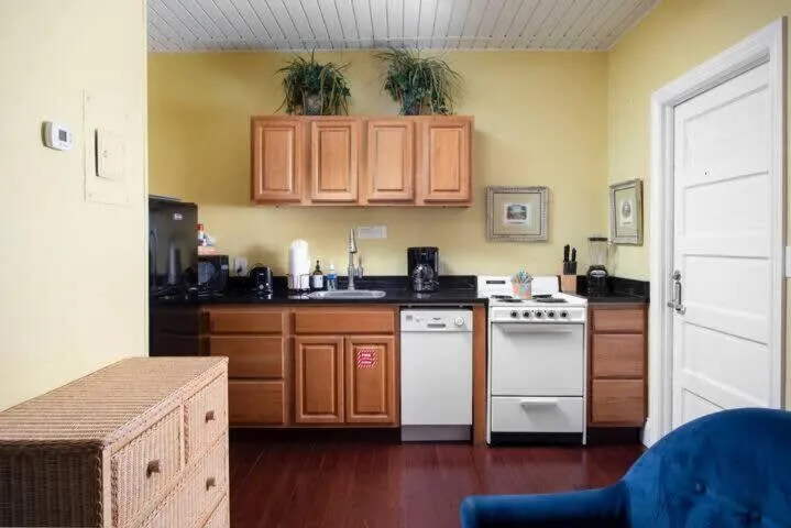 Kitchen or kitchenette in Four Suites on Duval Street w parking and pool