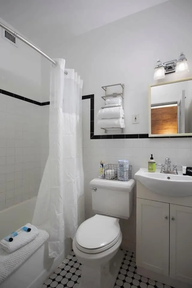 Shower in Four Suites on Duval Street w parking and pool