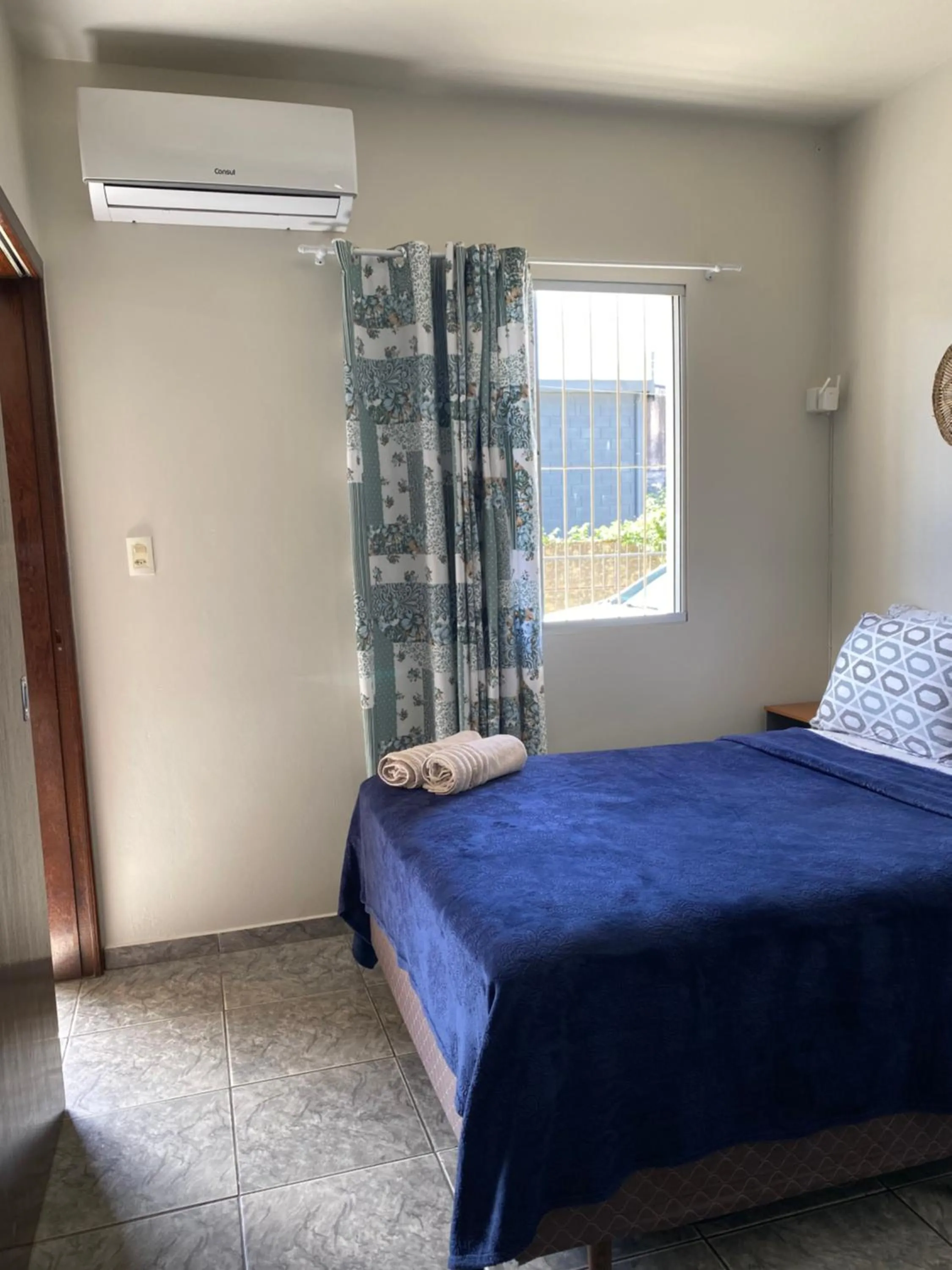 Bed in Apartamento cachoeira