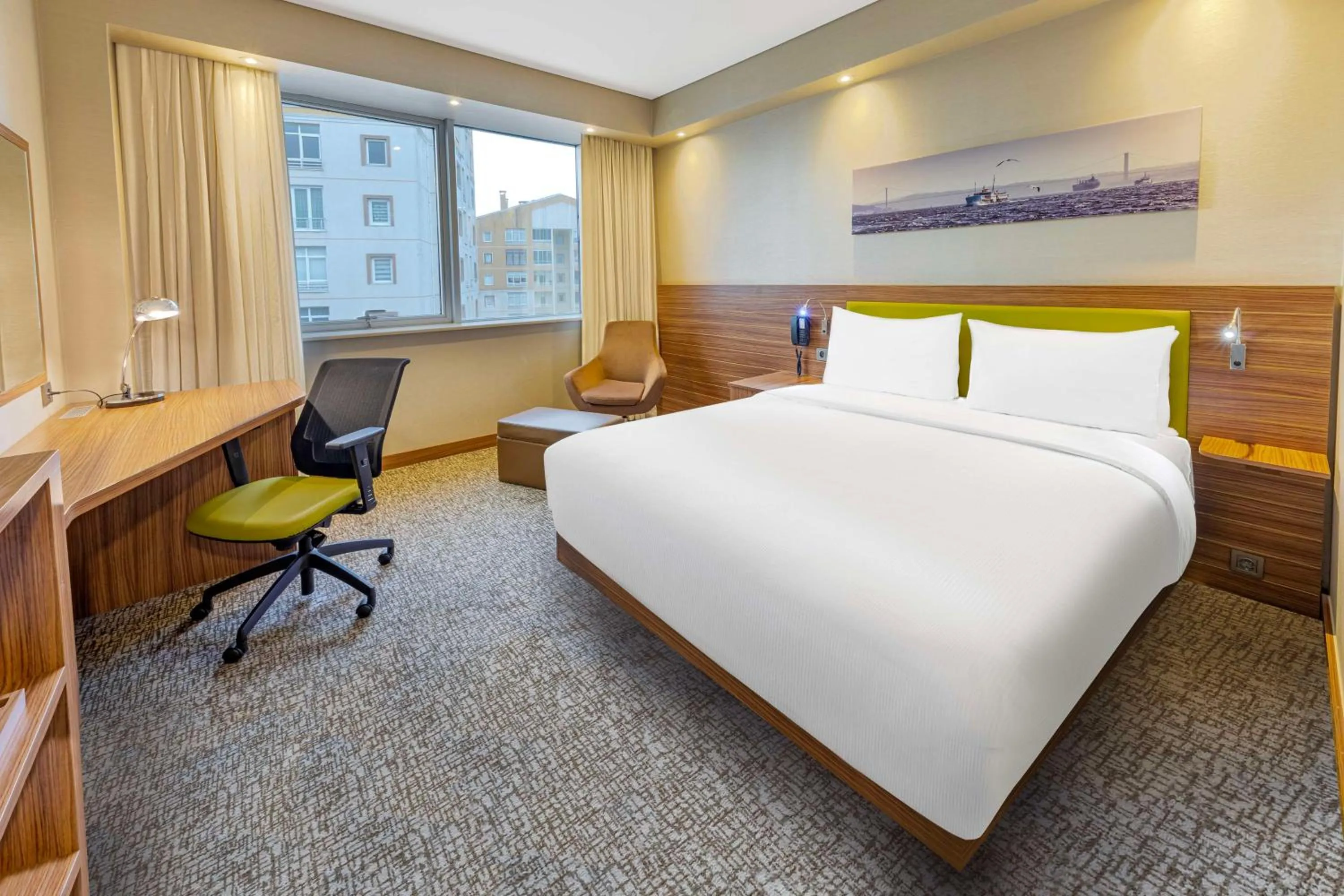 Living room, Bed in Hampton by Hilton Istanbul Kayasehir