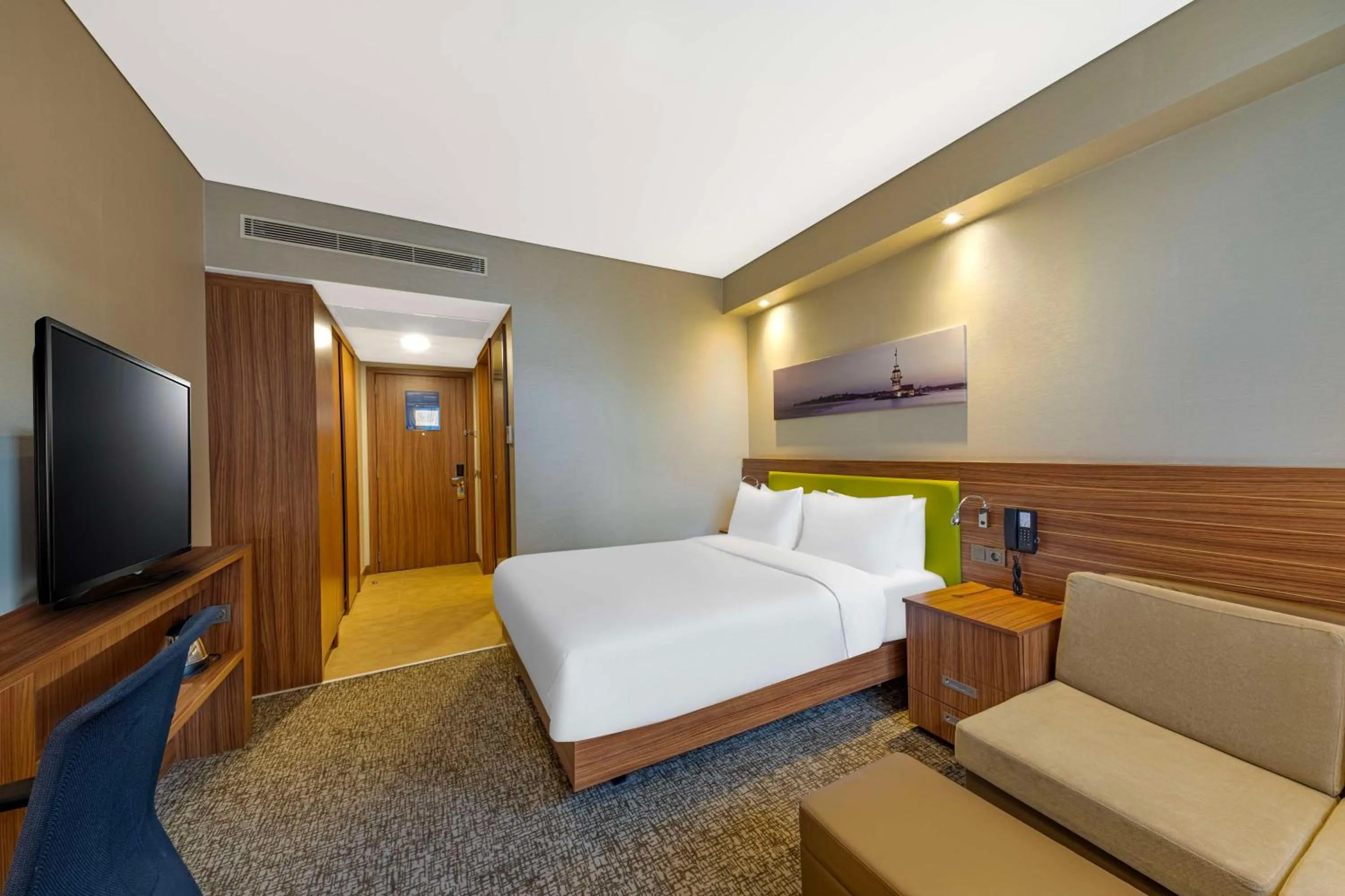 Living room, Bed in Hampton by Hilton Istanbul Kayasehir