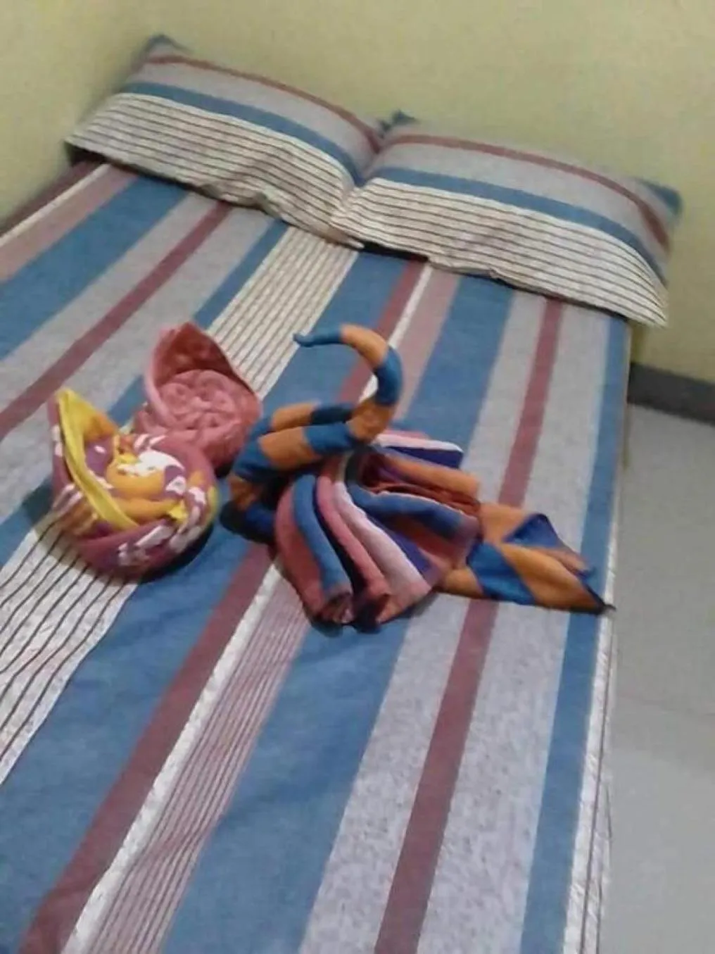 Bed in Livin's Inn Tuguegarao