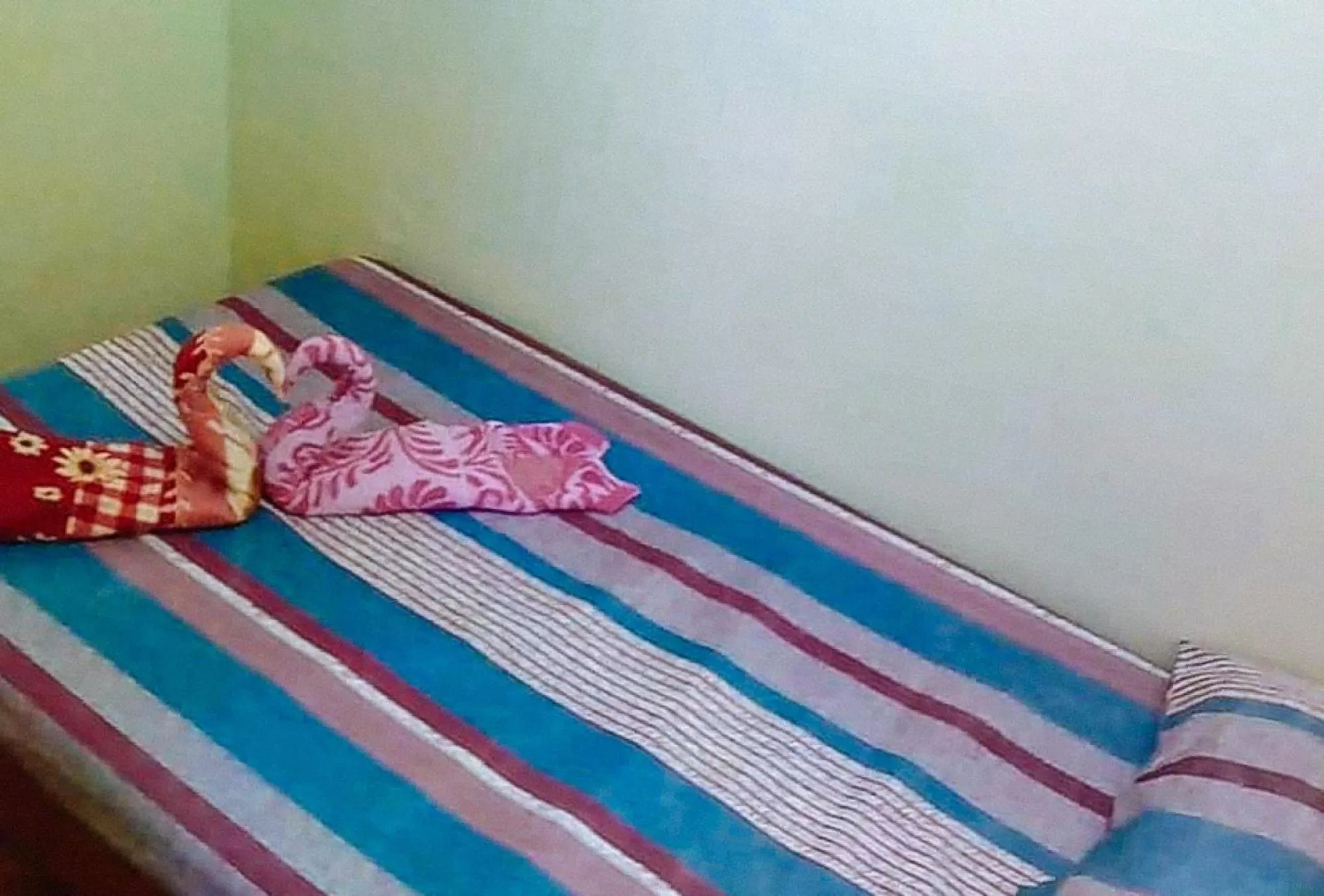 Bed in Livin's Inn Tuguegarao