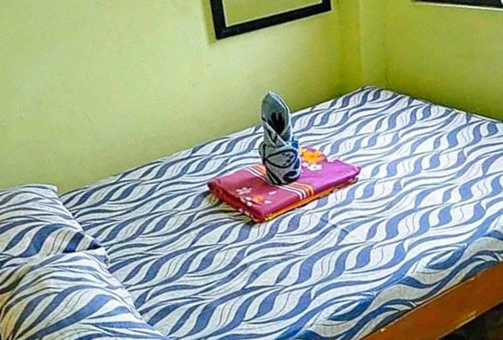 Bed in Livin's Inn Tuguegarao