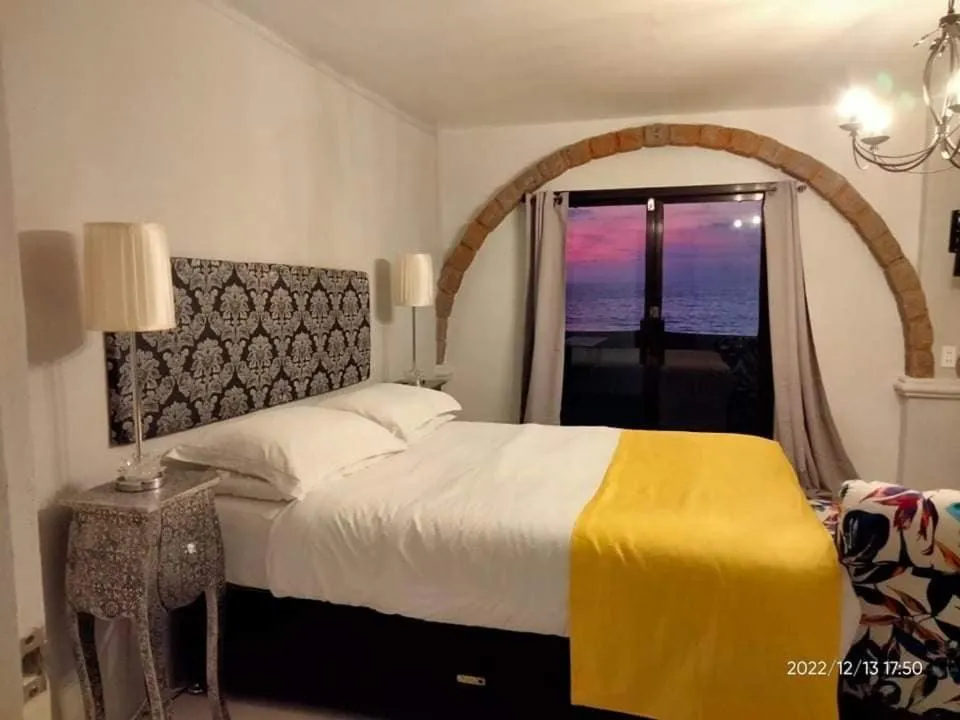 Bed in Sunbloom Beachfront Hotel and Restaurant Zambales