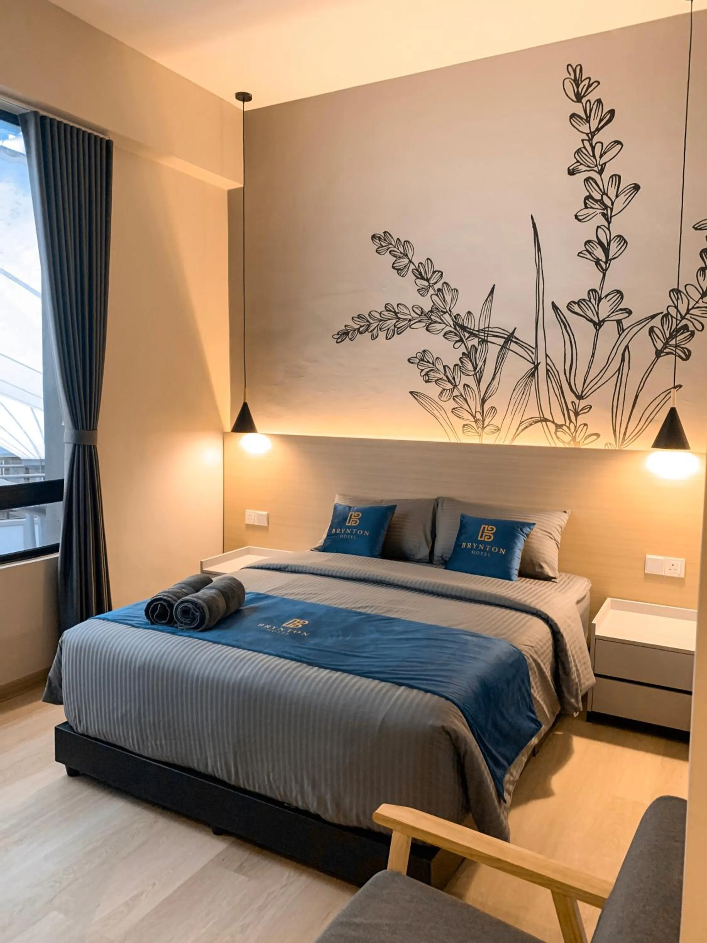 Bed in Hotel Brynton at Cameron Centrum Mall