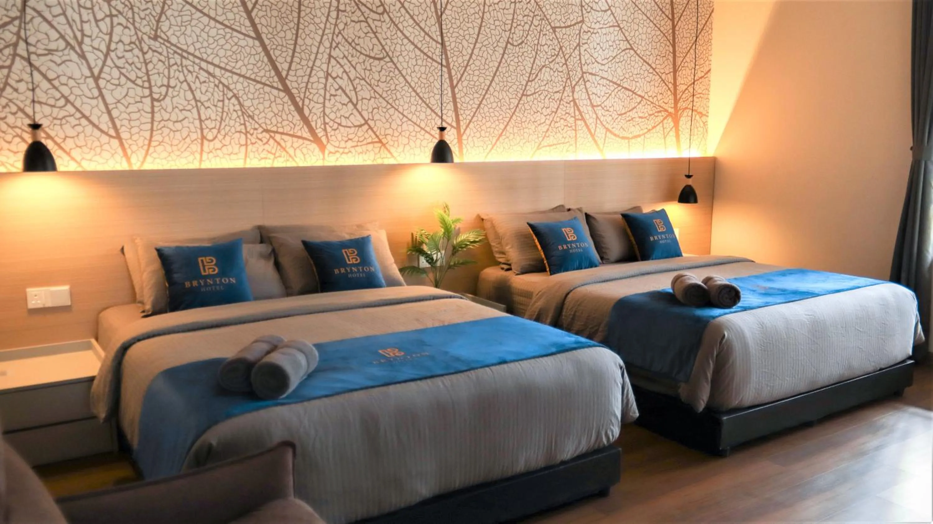 Bed in Hotel Brynton at Cameron Centrum Mall