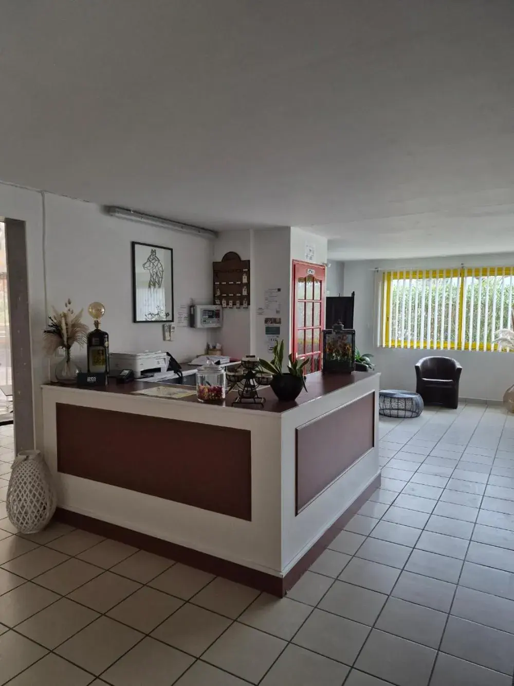 Living room in Logis hôtel restaurant Le clos saint loup Living room in Logis hôtel restaurant Le clos saint loup