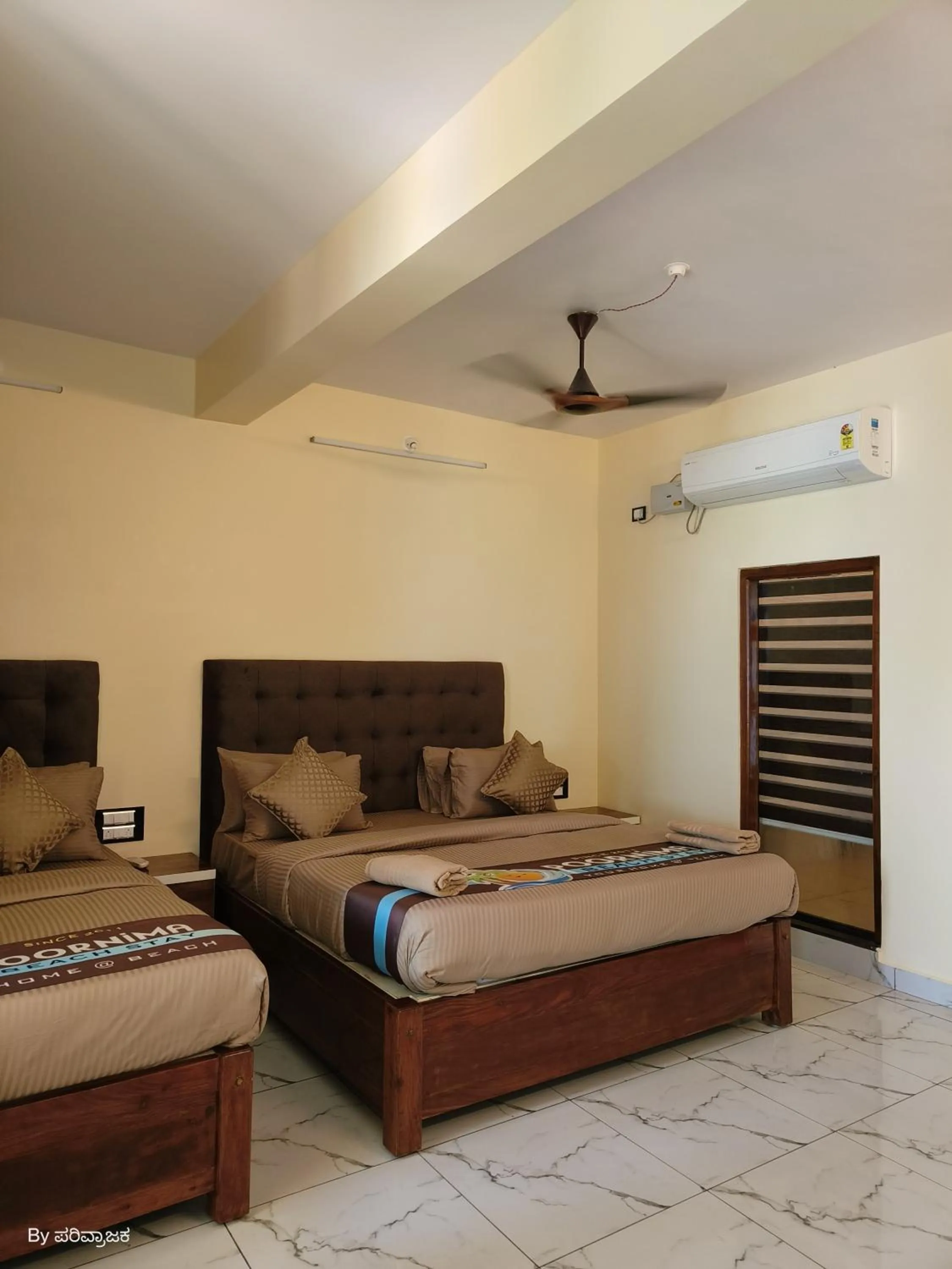 Bed in Poornima Beach Stay