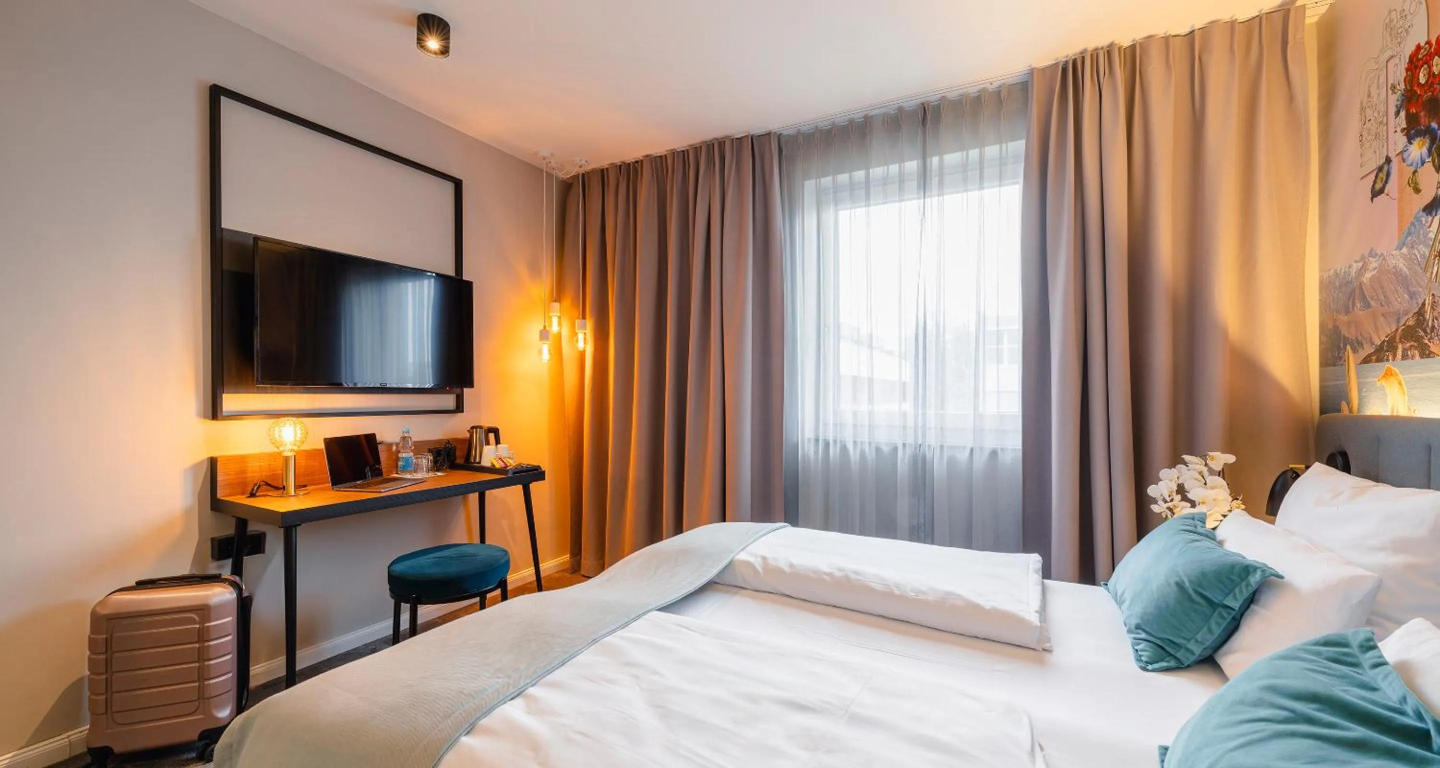 TV and multimedia, Bed in PLAZA INN Ulm