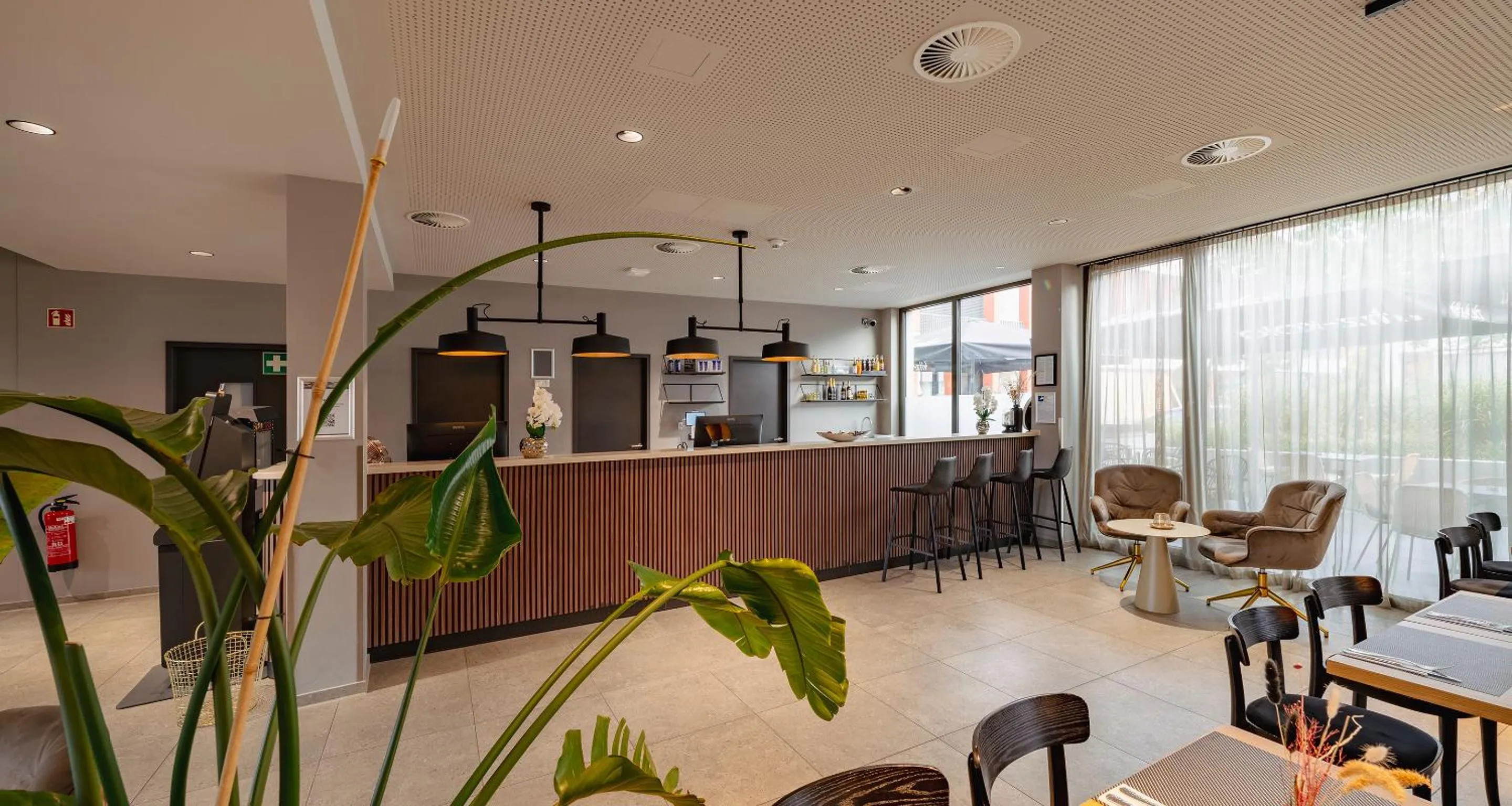 Lobby or reception in PLAZA INN Ulm