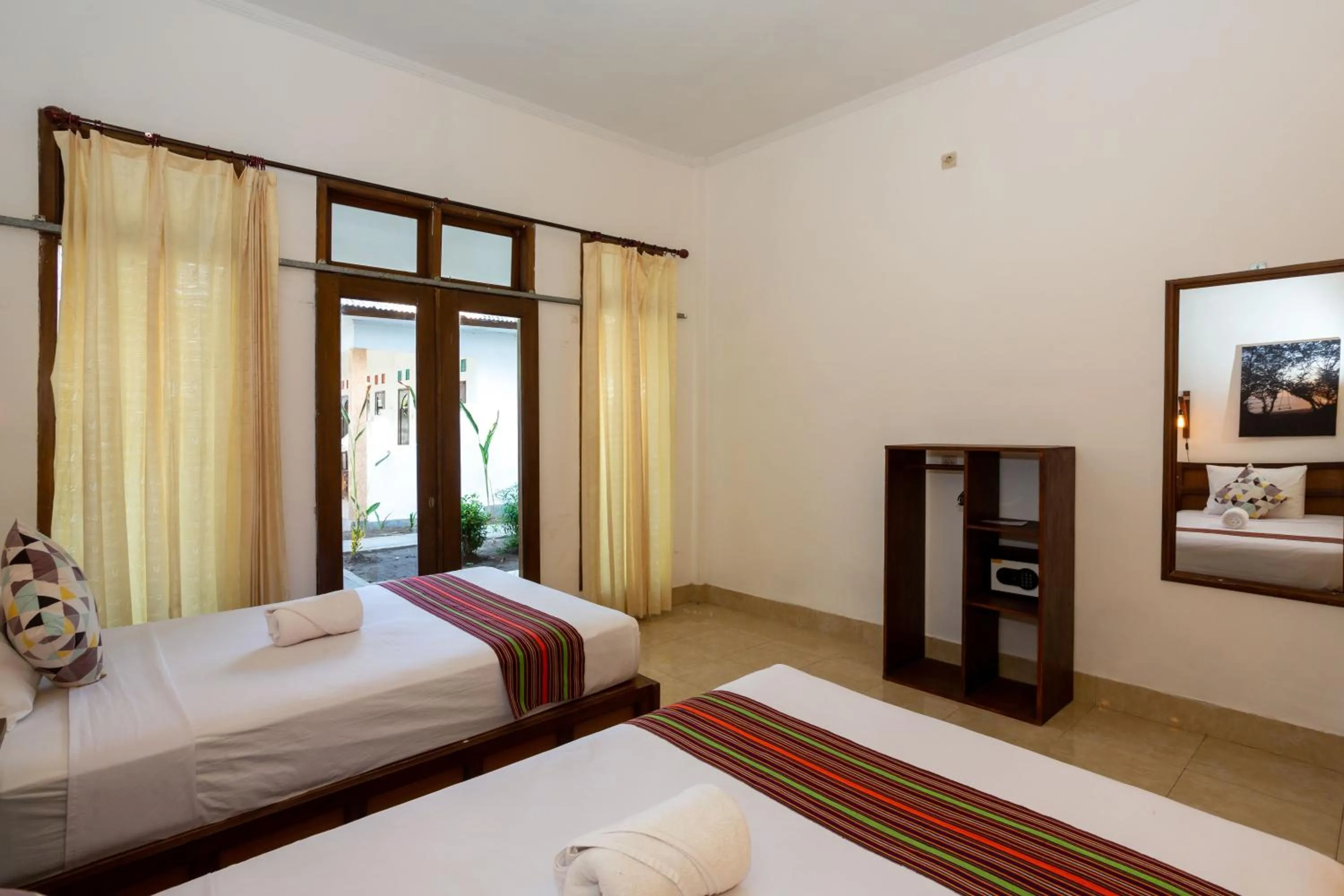 Bed in Kidi's Lodge Gilitrawangan