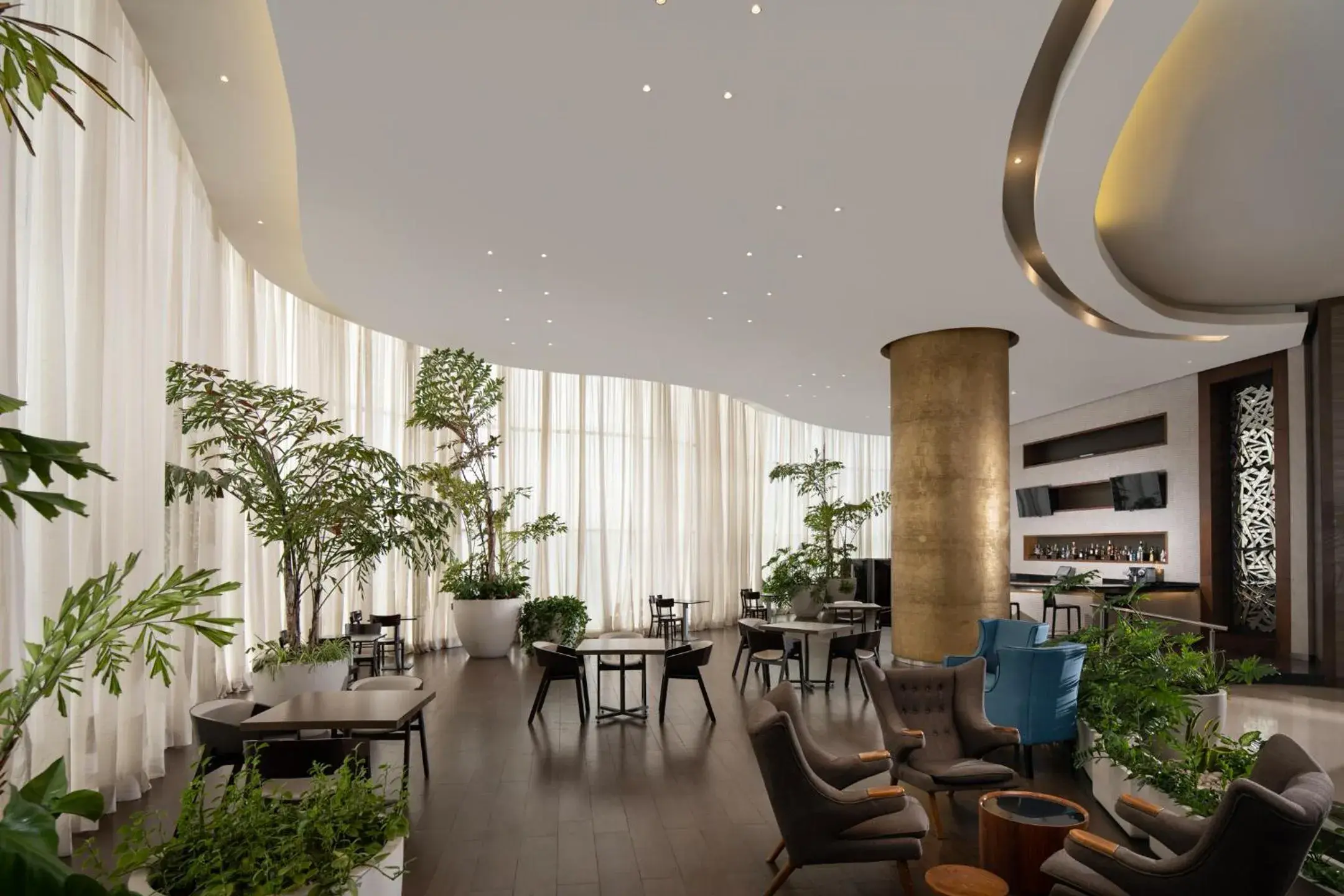 Living room in Embassy Suites by Hilton Santo Domingo Living room in Embassy Suites by Hilton Santo Domingo