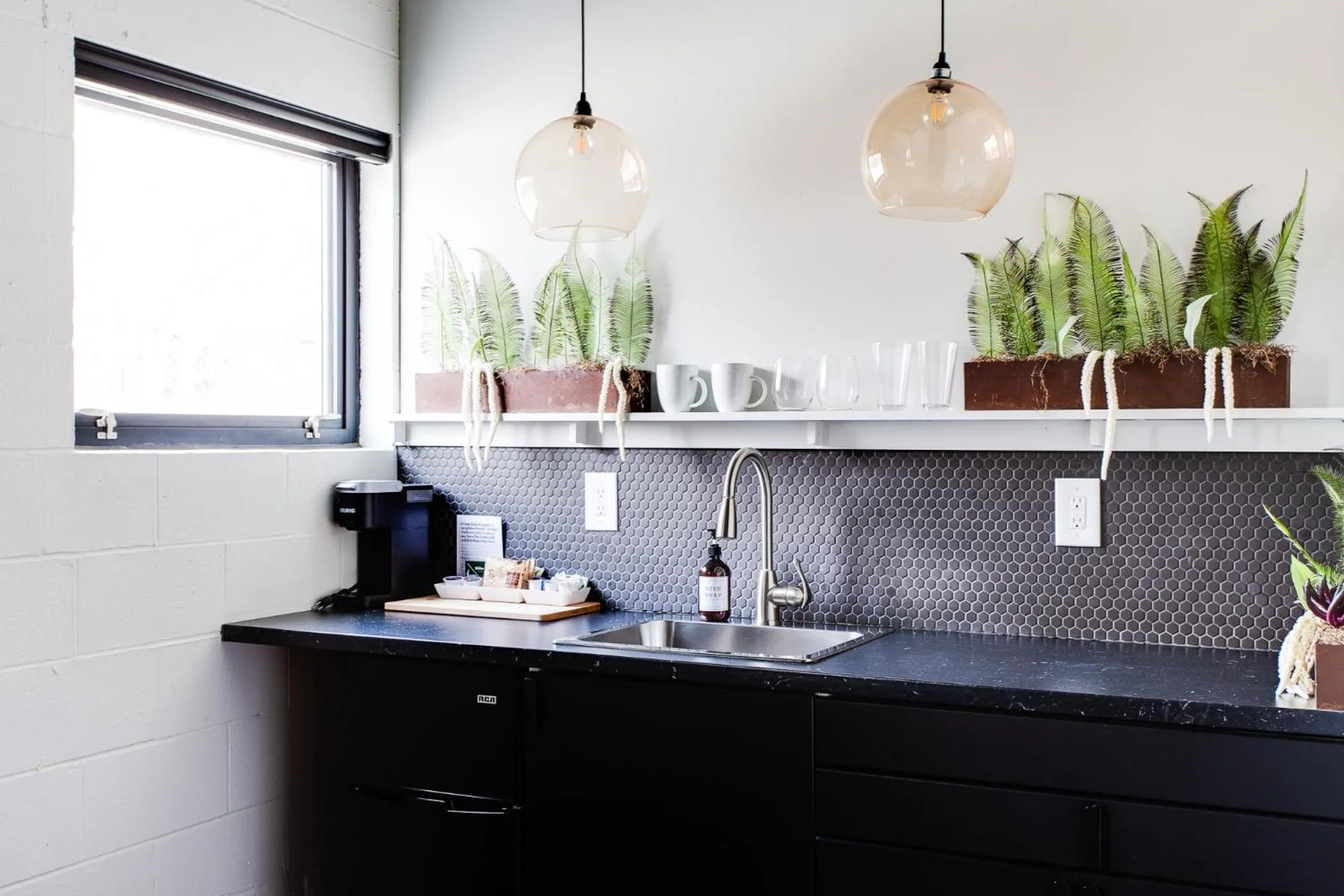 Kitchen or kitchenette in Stellar Suites