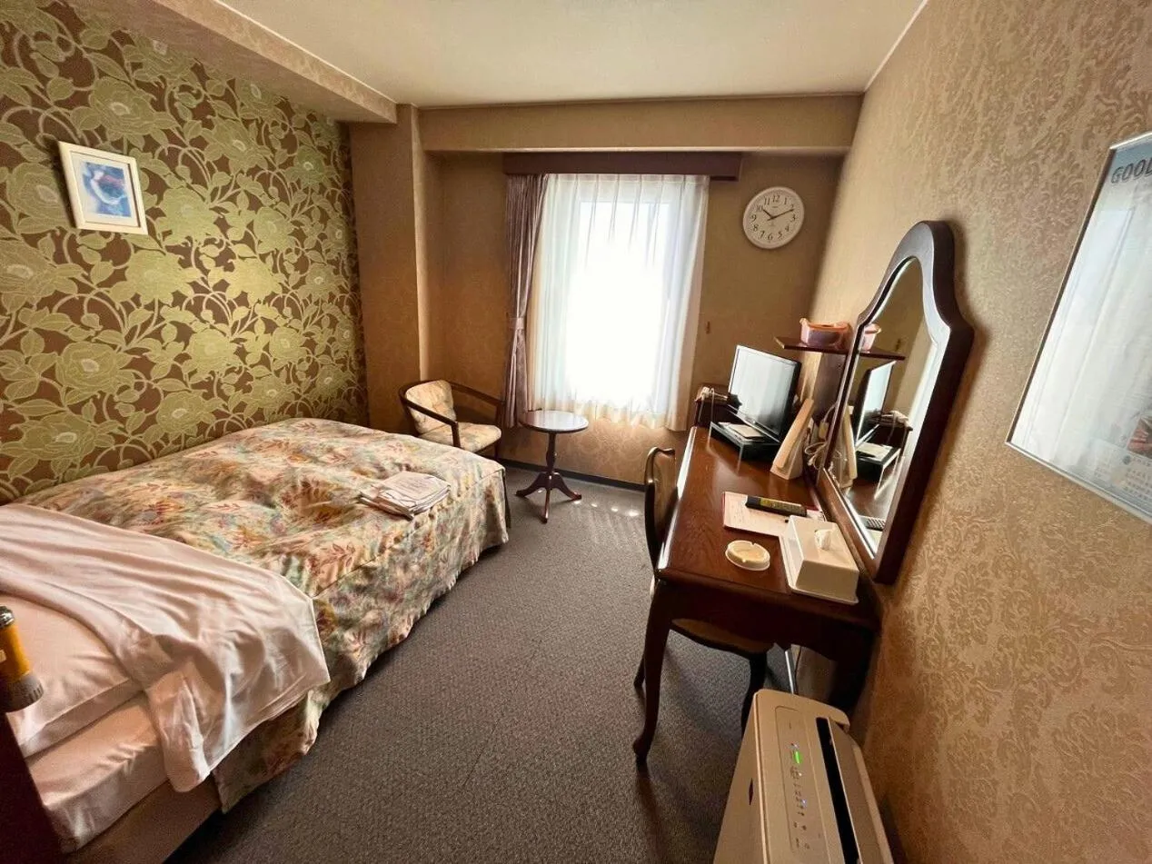 Bed in Seaside Hotel Kamome