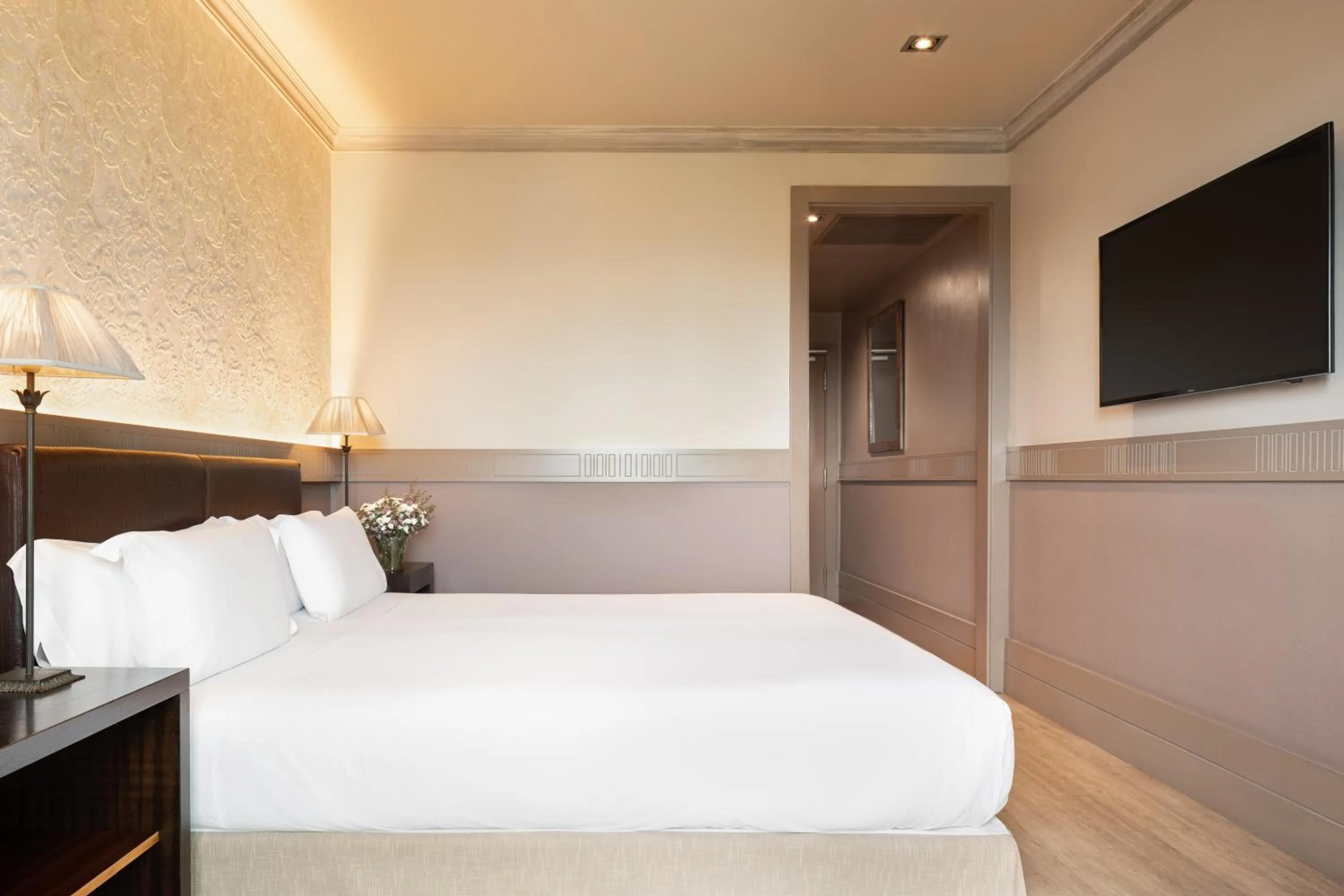 Bed in Duquesa de Cardona Hotel 4 Sup by Grup Duquessa