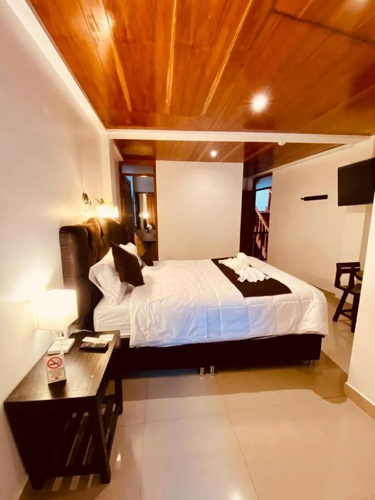 Bed in SAYACMARCA CLASSIC Inn