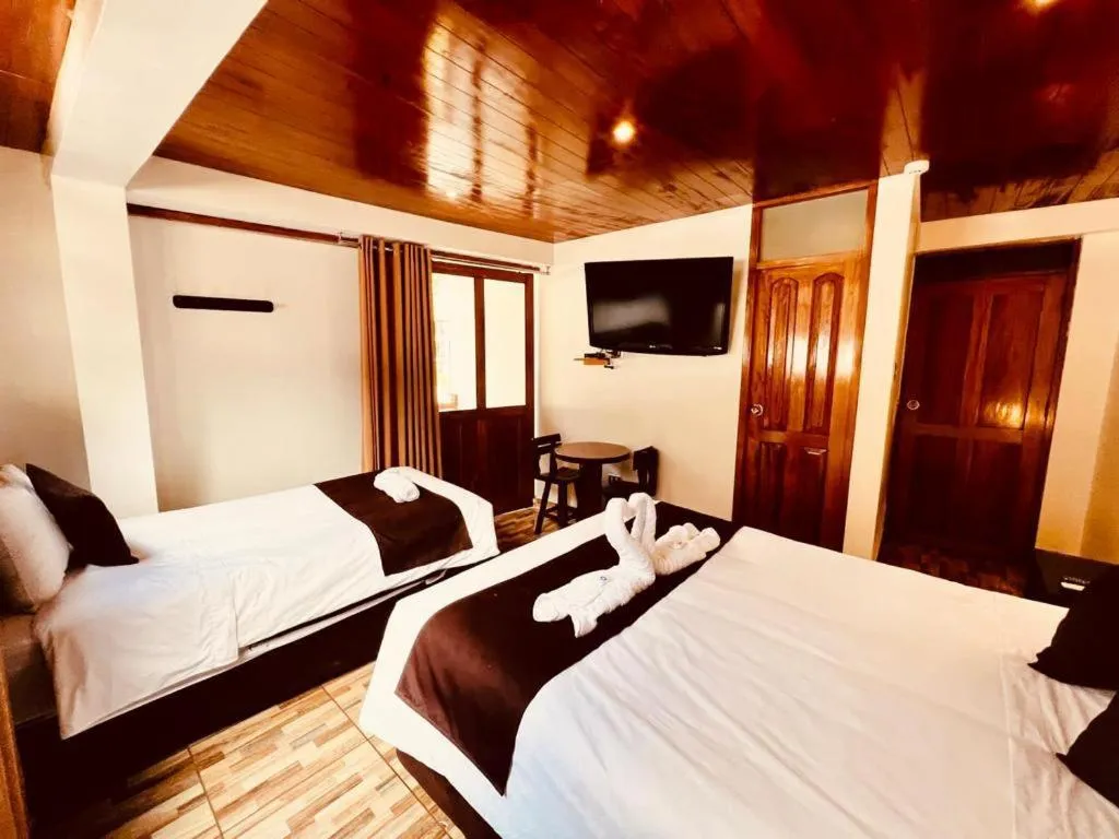 Bed in SAYACMARCA CLASSIC Inn
