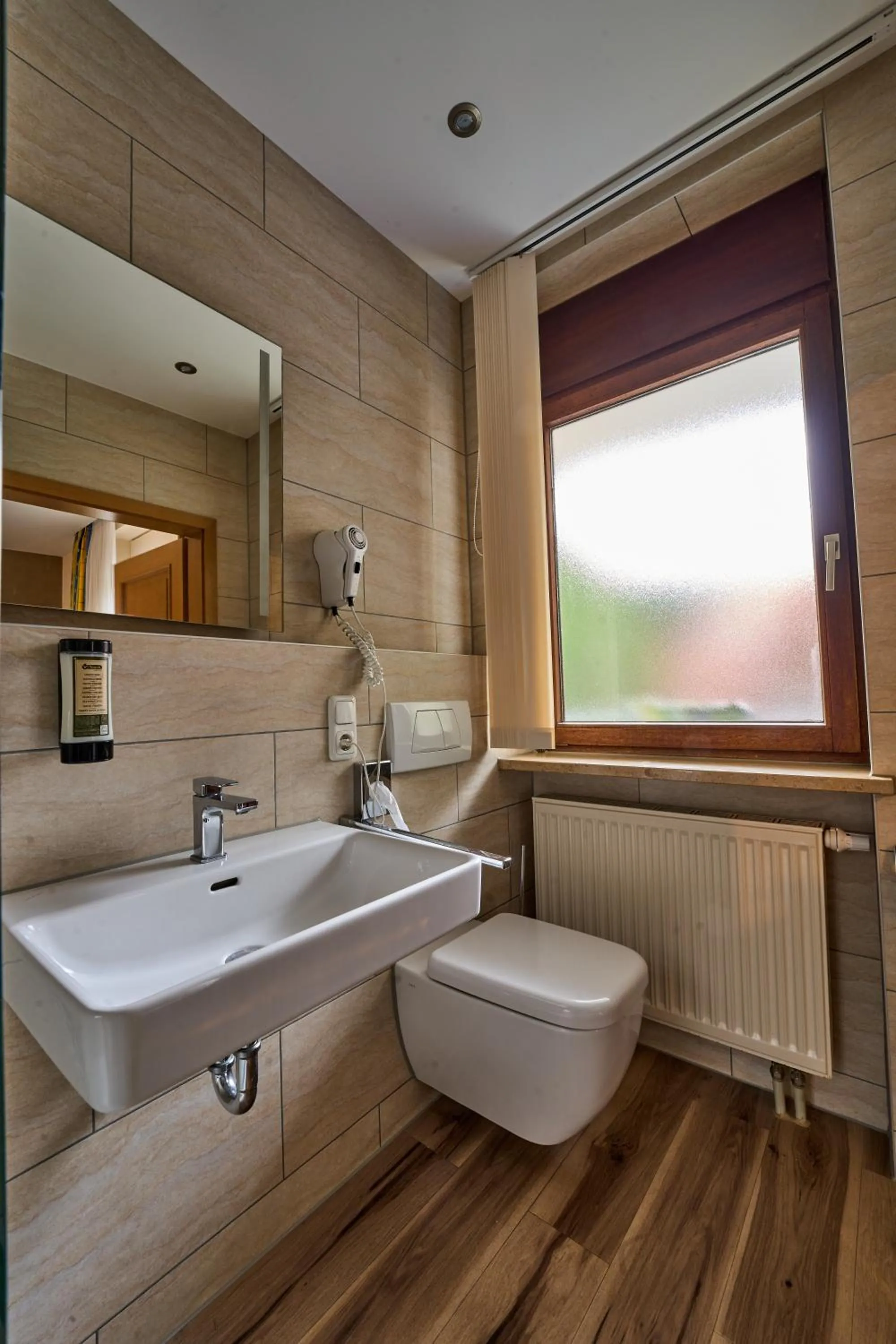 Bathroom in Gästehaus Forellenhof