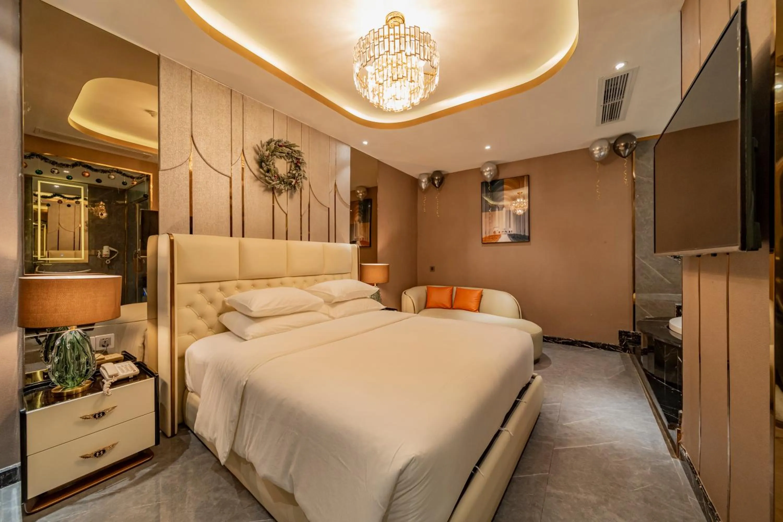 Bed in Enjoy Boutique Saigon Hotel