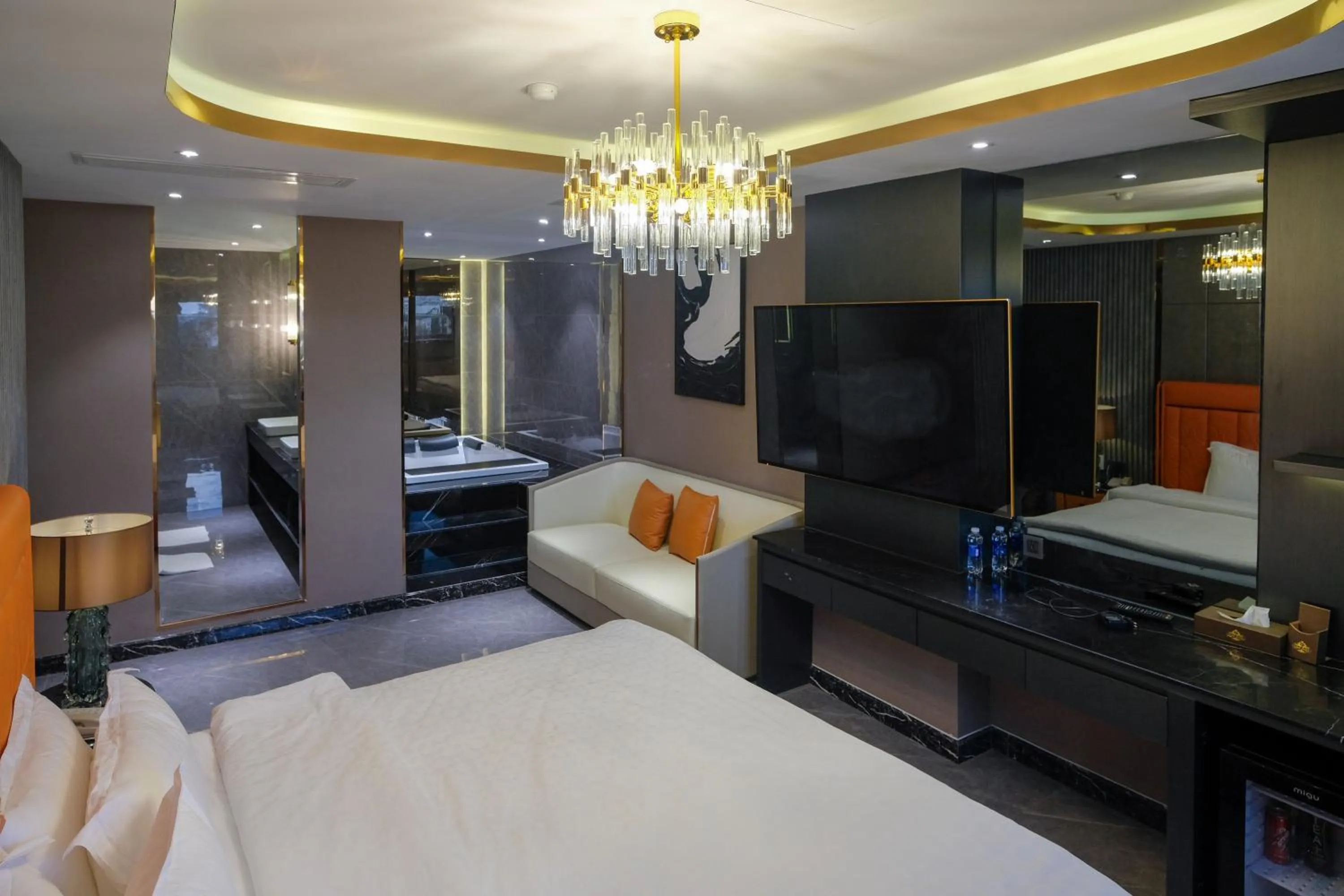 Bed in Enjoy Boutique Saigon Hotel