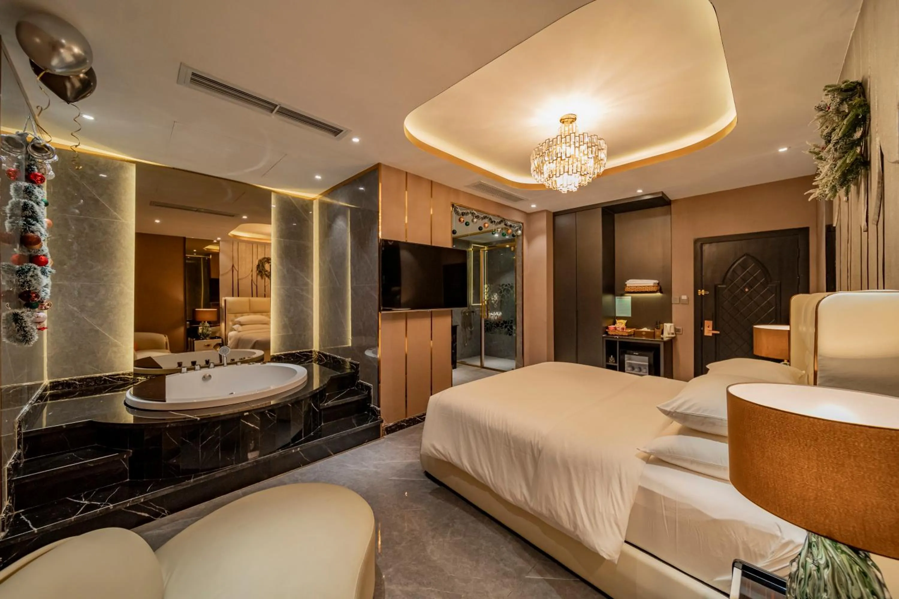 Bed in Enjoy Boutique Saigon Hotel