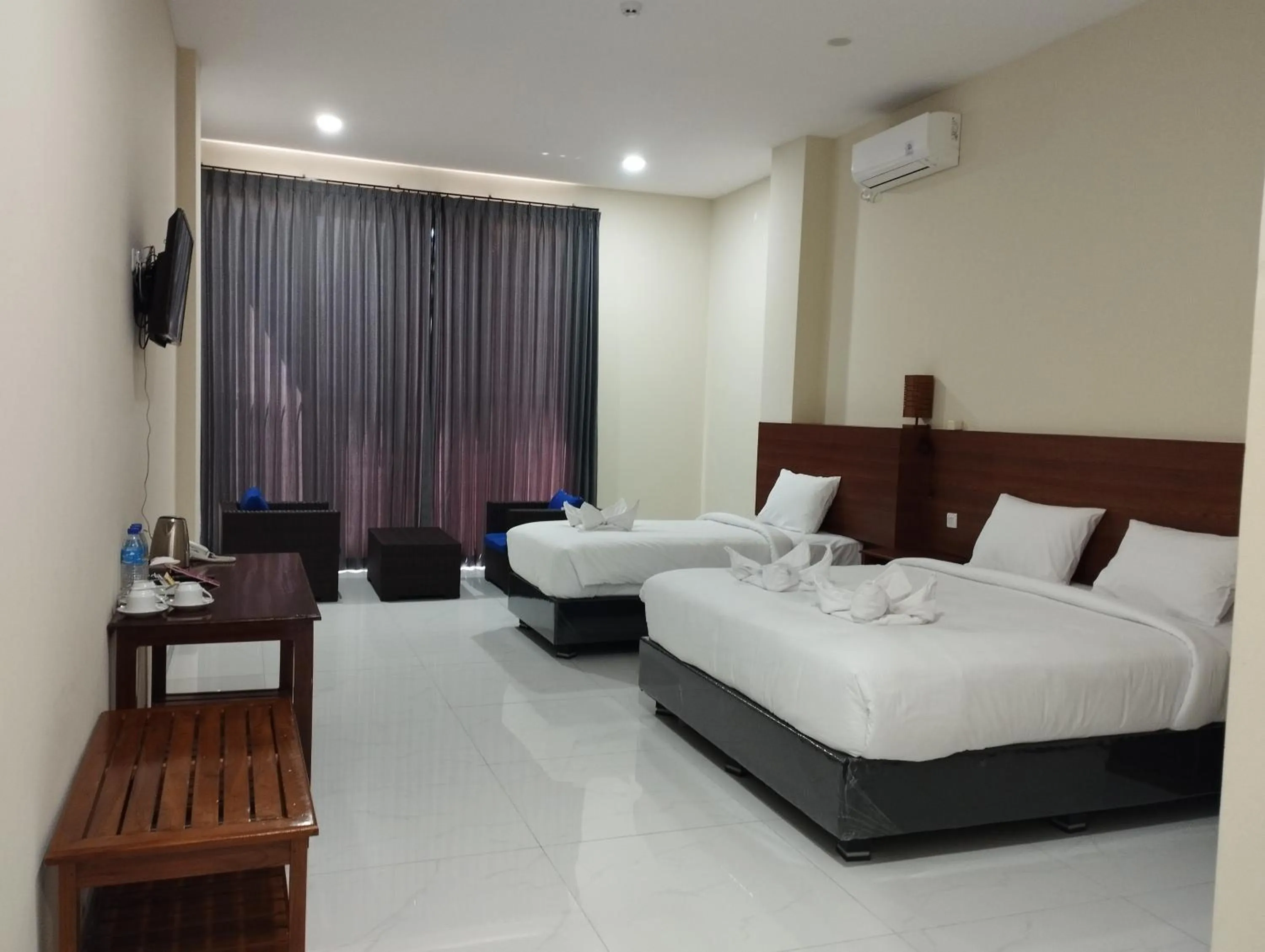 Bed in Palm bajo hotel