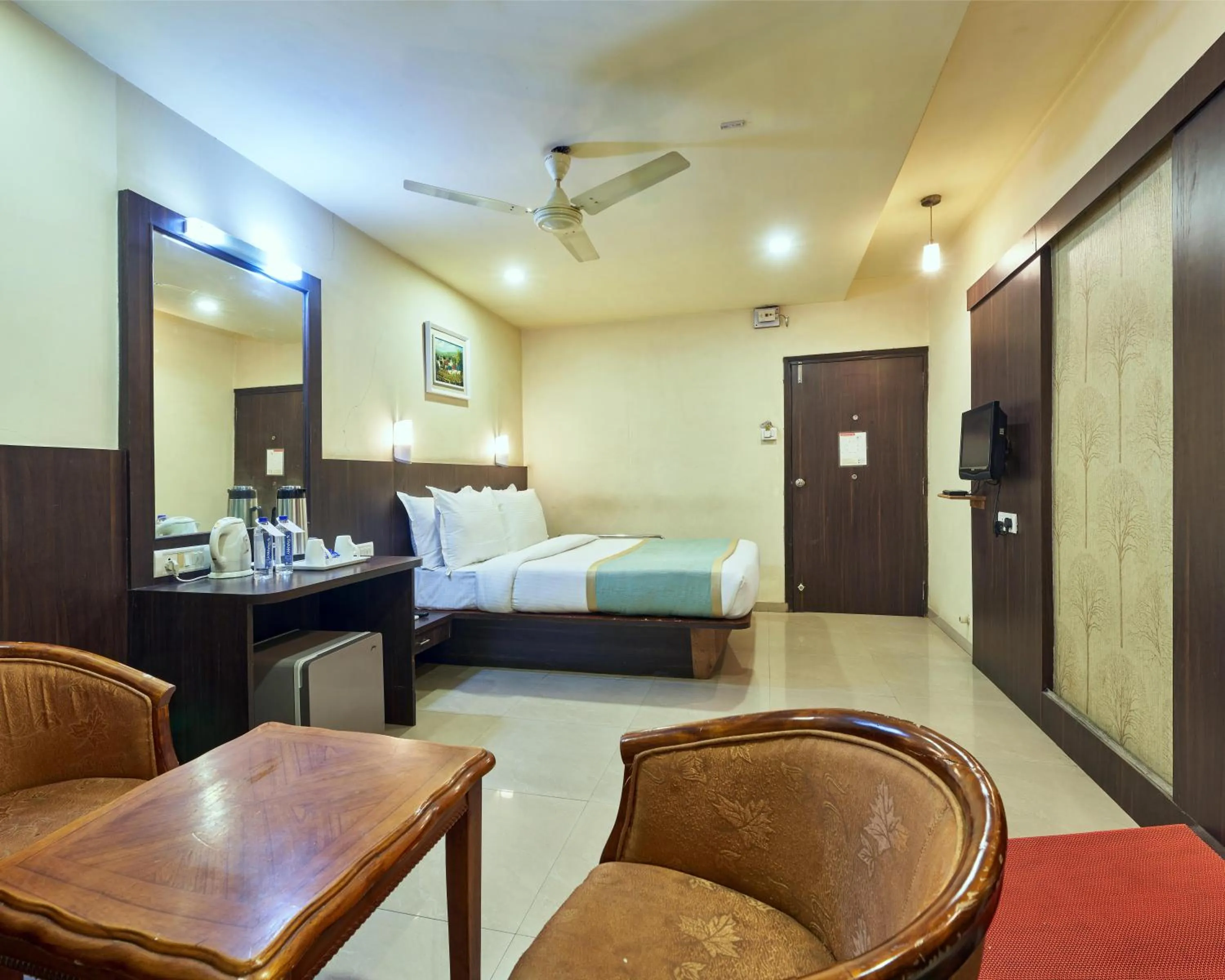 Photo of the whole room, Bed in Hotel Atria, Kolhapur