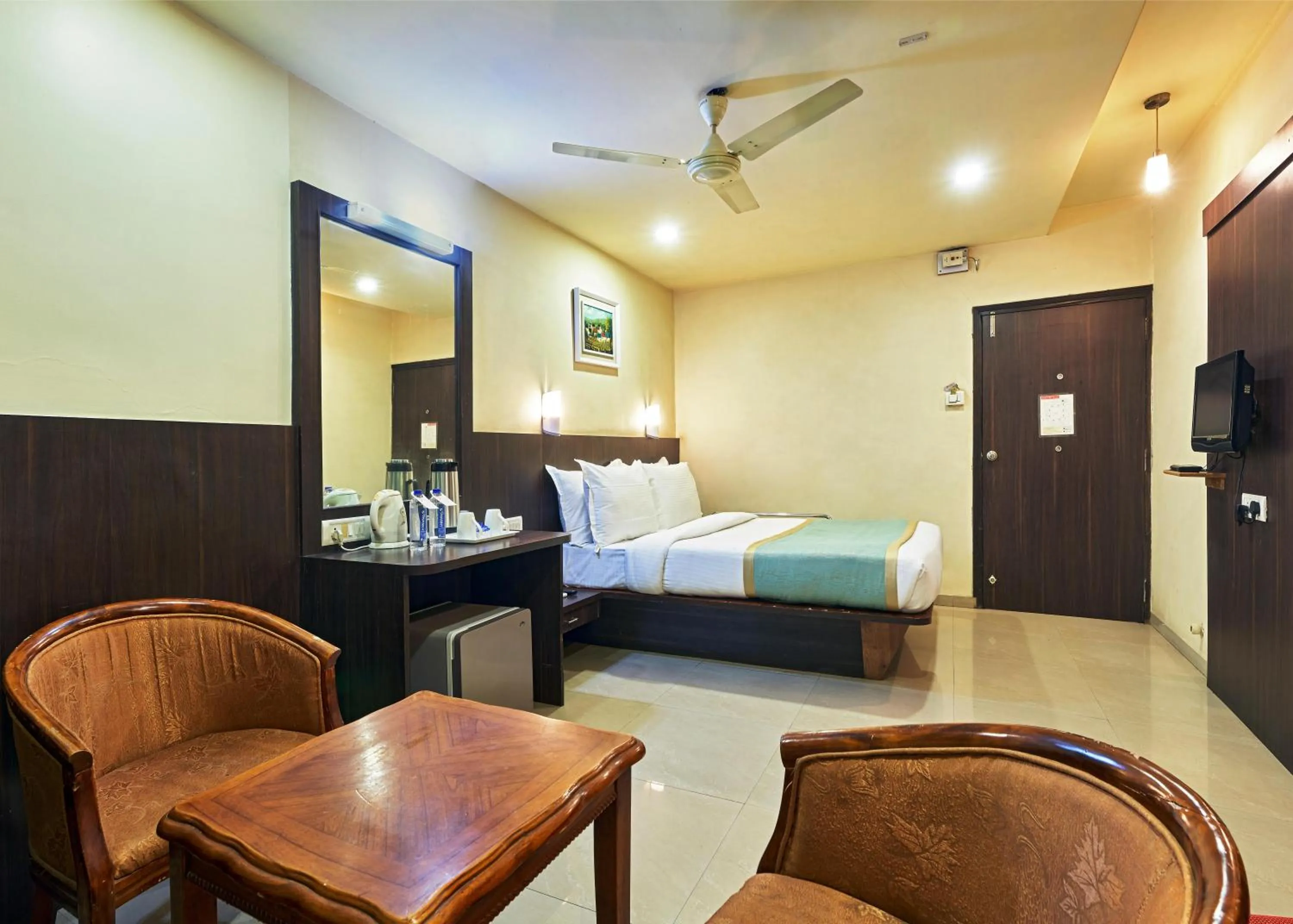 Photo of the whole room, Bed in Hotel Atria, Kolhapur
