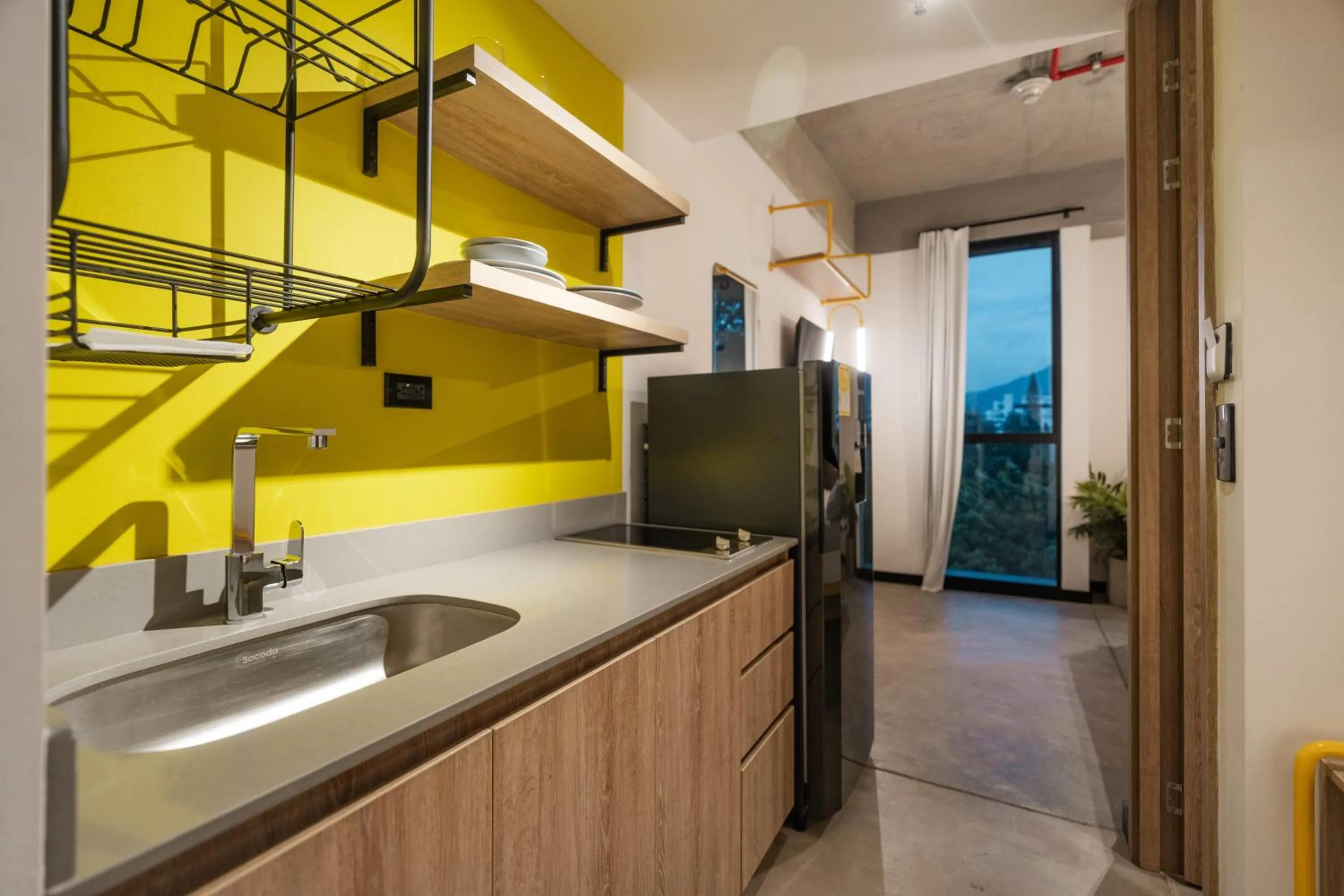 Kitchen or kitchenette in Indie Universe Creative Hotel